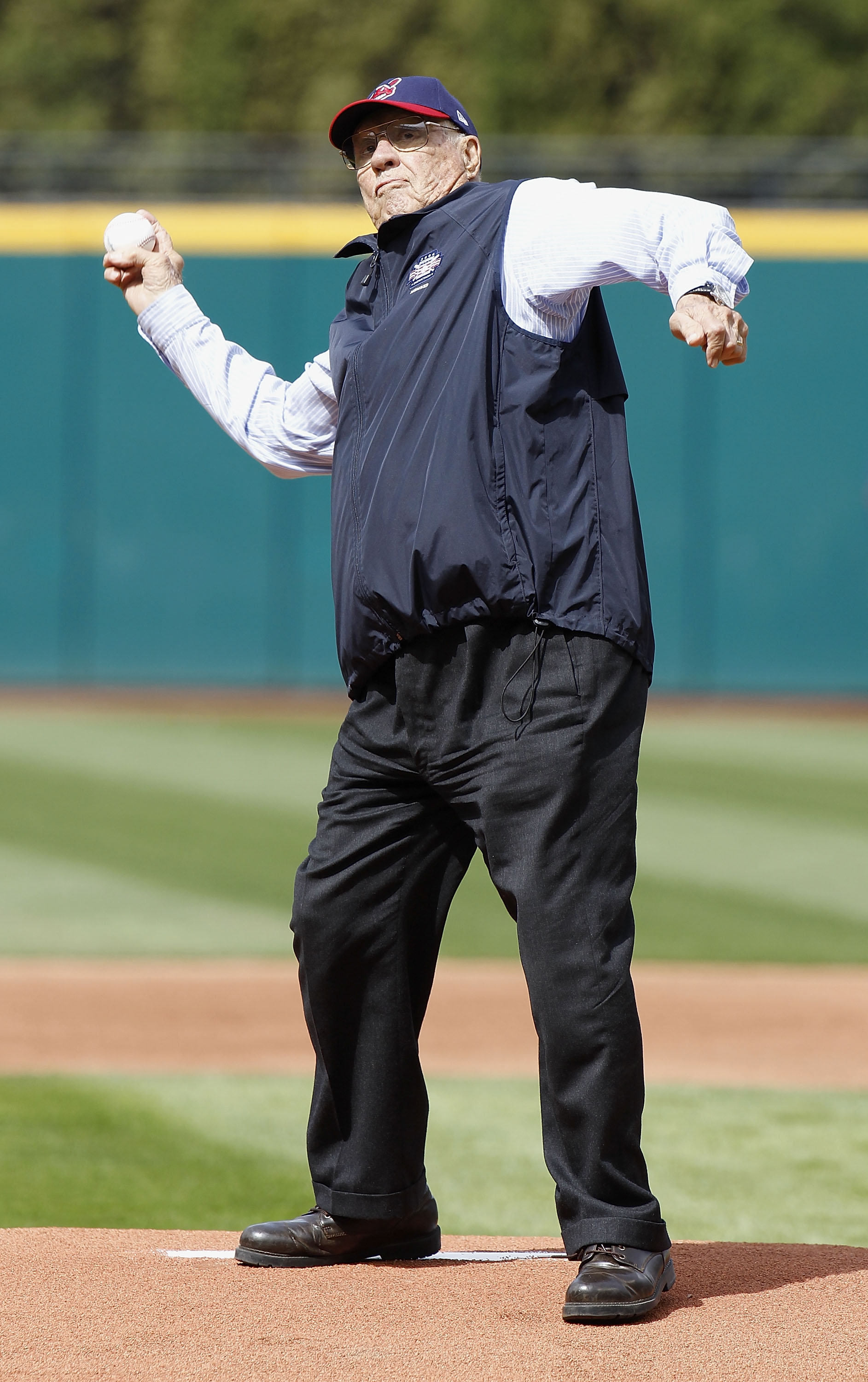 CLEVELAND, OH - APRIL 12: Hall of Fame Cleveland Indian pitcher Bob Feller throws out the first pitch prior to the Cleveland Indians playing the Texas Rangers duirng Opening Day on April 12, 2010 at Progressive Field in Cleveland, Ohio.  (Photo by Gregory