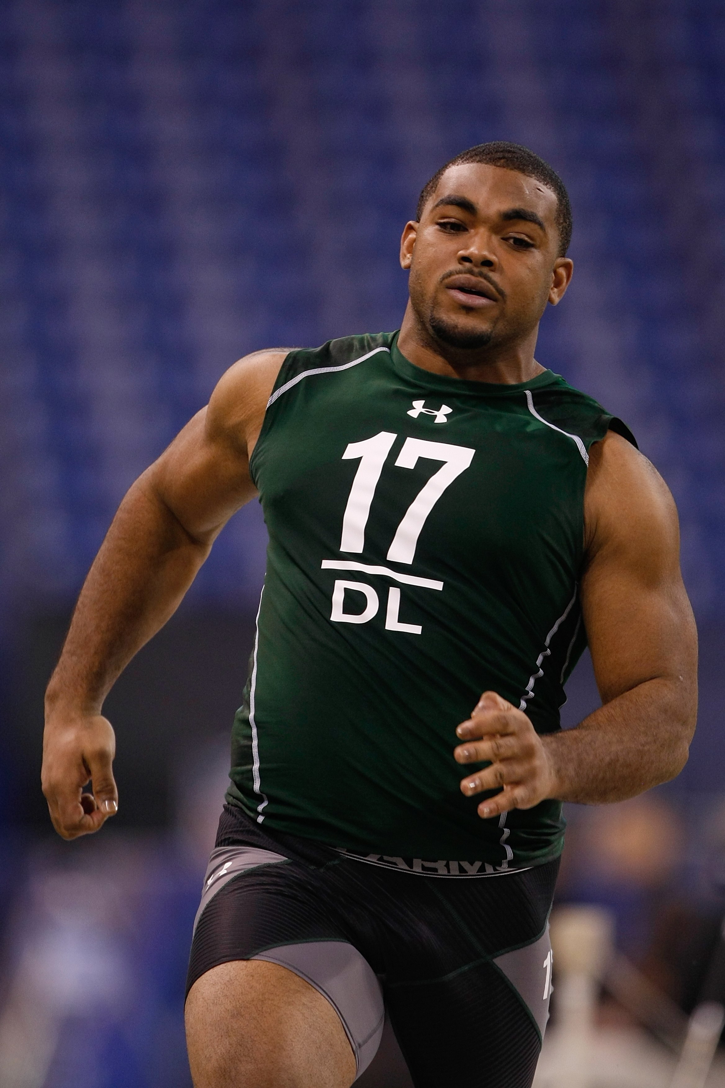 INDIANAPOLIS, IN - MARCH 1: Defensive lineman Brandon Graham of Michigan runs the 40 yard dash during the NFL Scouting Combine presented by Under Armour at Lucas Oil Stadium on March 1, 2010 in Indianapolis, Indiana. (Photo by Scott Boehm/Getty Images)