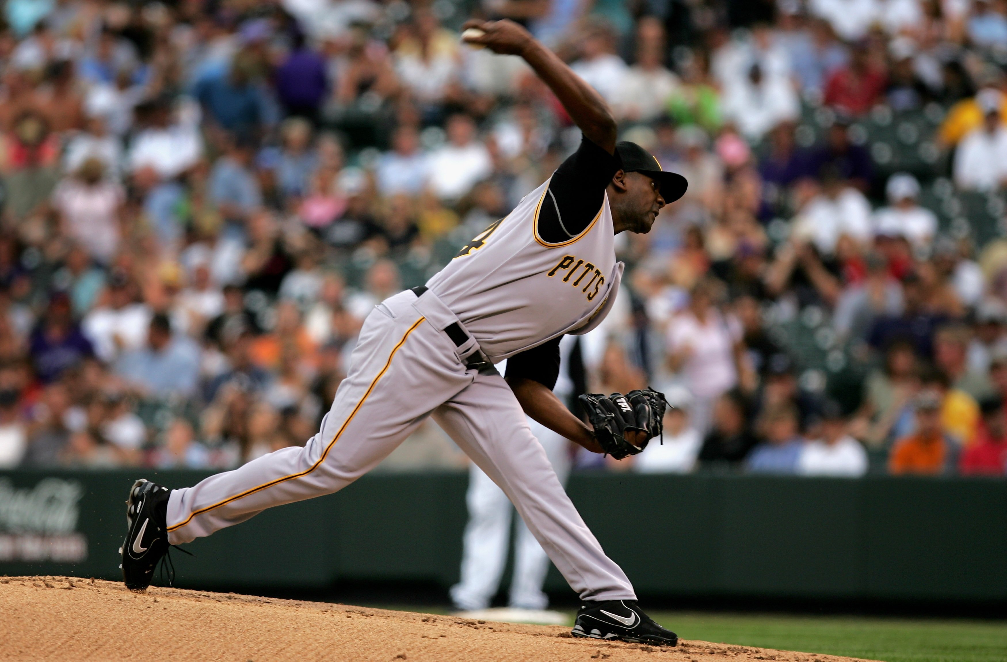 DENVER - JULY 19:  Starting pitcher Yoslan Herrera #64 of the Pittsburgh Pirates delivers against the Colorado Rockies at Coors Field on July 19, 2008 in Denver, Colorado. Herrera gave up seven runs in 1 2/3 innings and collected the loss as the Rockies d