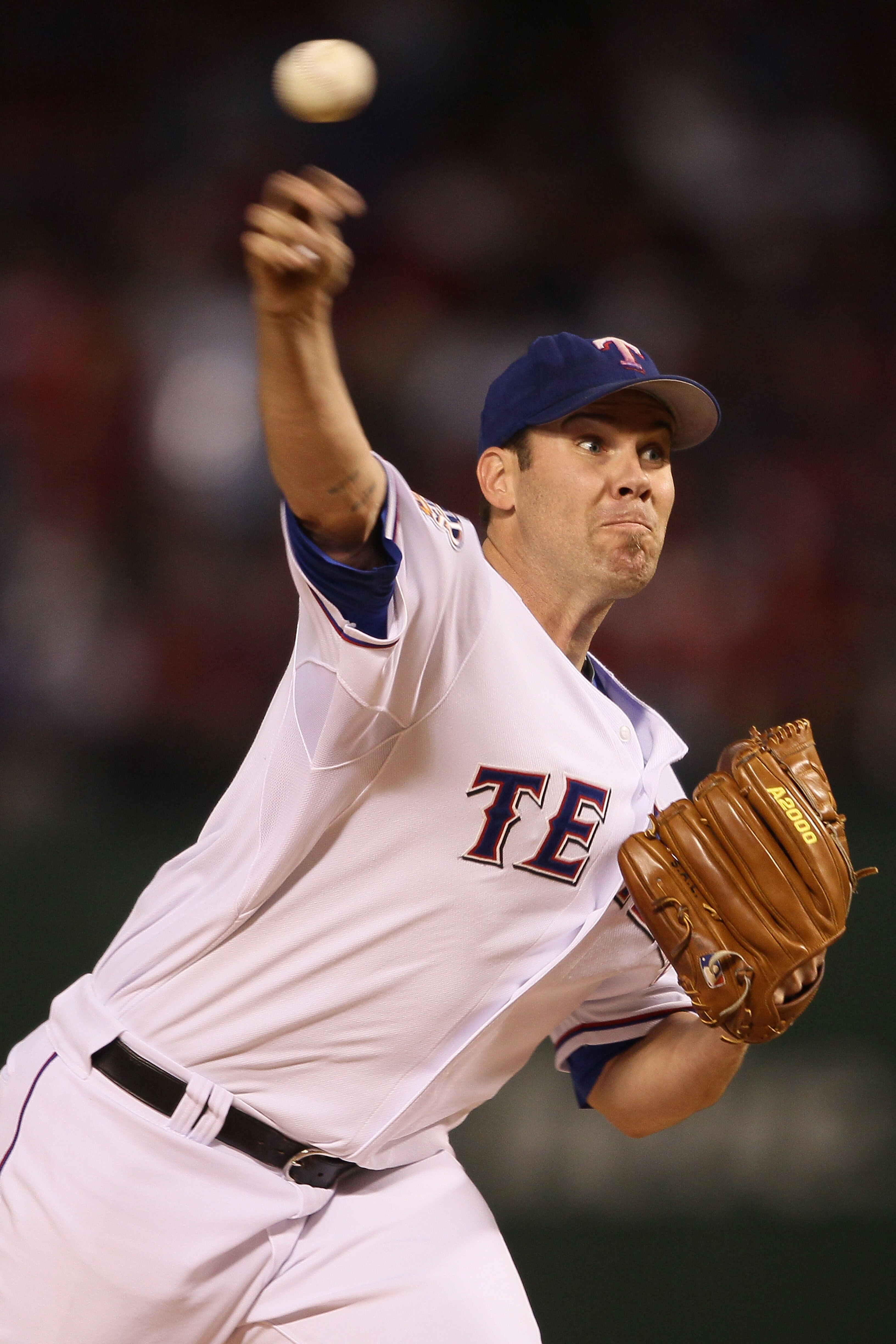 ARLINGTON, TX - OCTOBER 30:  Starting pitcher Colby Lewis #48 of the Texas Rangers pitches against the San Francisco Giants in Game Three of the 2010 MLB World Series at Rangers Ballpark in Arlington on October 30, 2010 in Arlington, Texas.  (Photo by Els