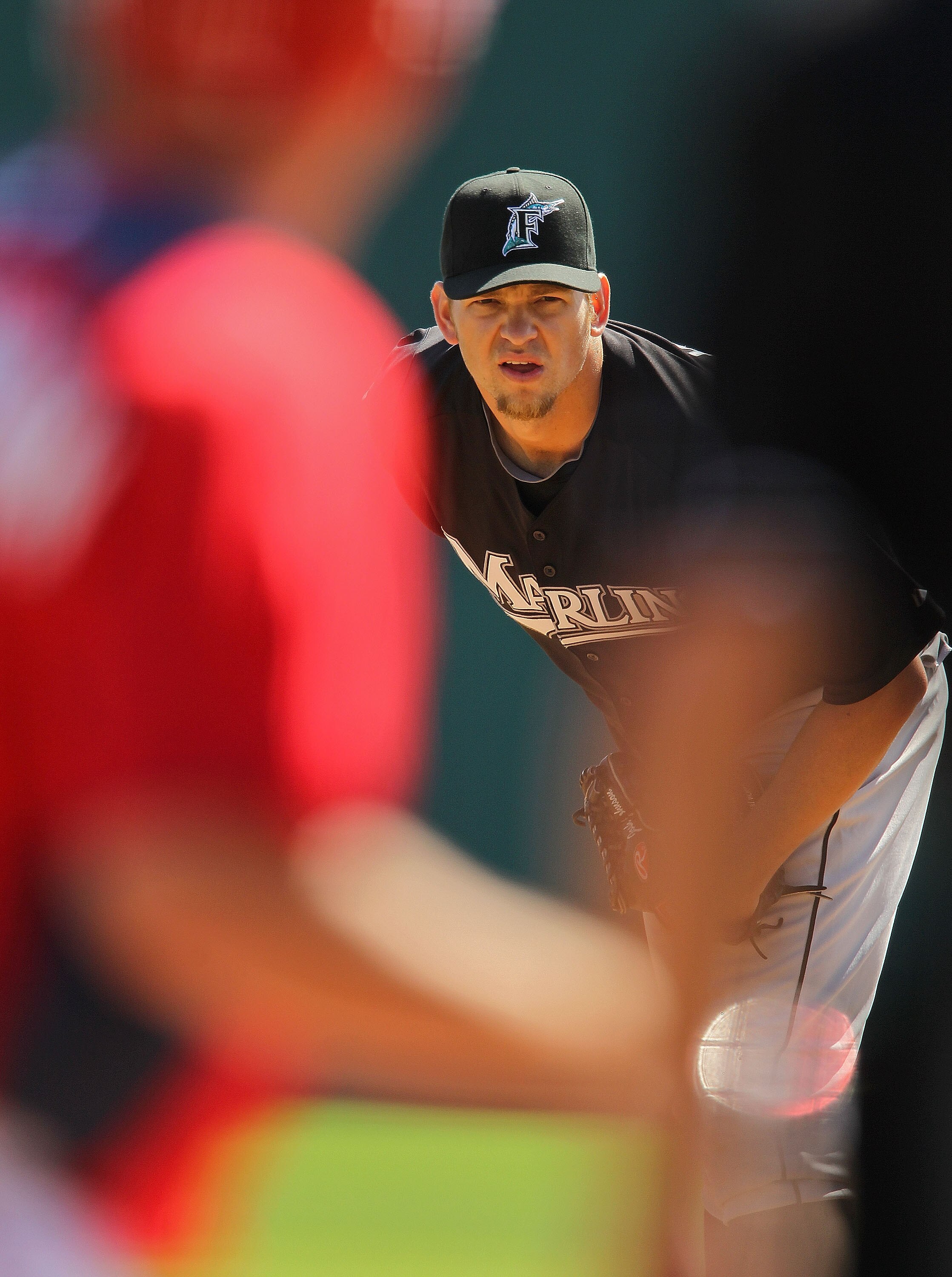 VIERA, FL - MARCH 02: Josh Johnson #55  of the Florida Marlins pitches during a Spring Training game against the Washington Nationals at Space Coast Stadium on March 2, 2011 in Viera, Florida.  (Photo by Mike Ehrmann/Getty Images)