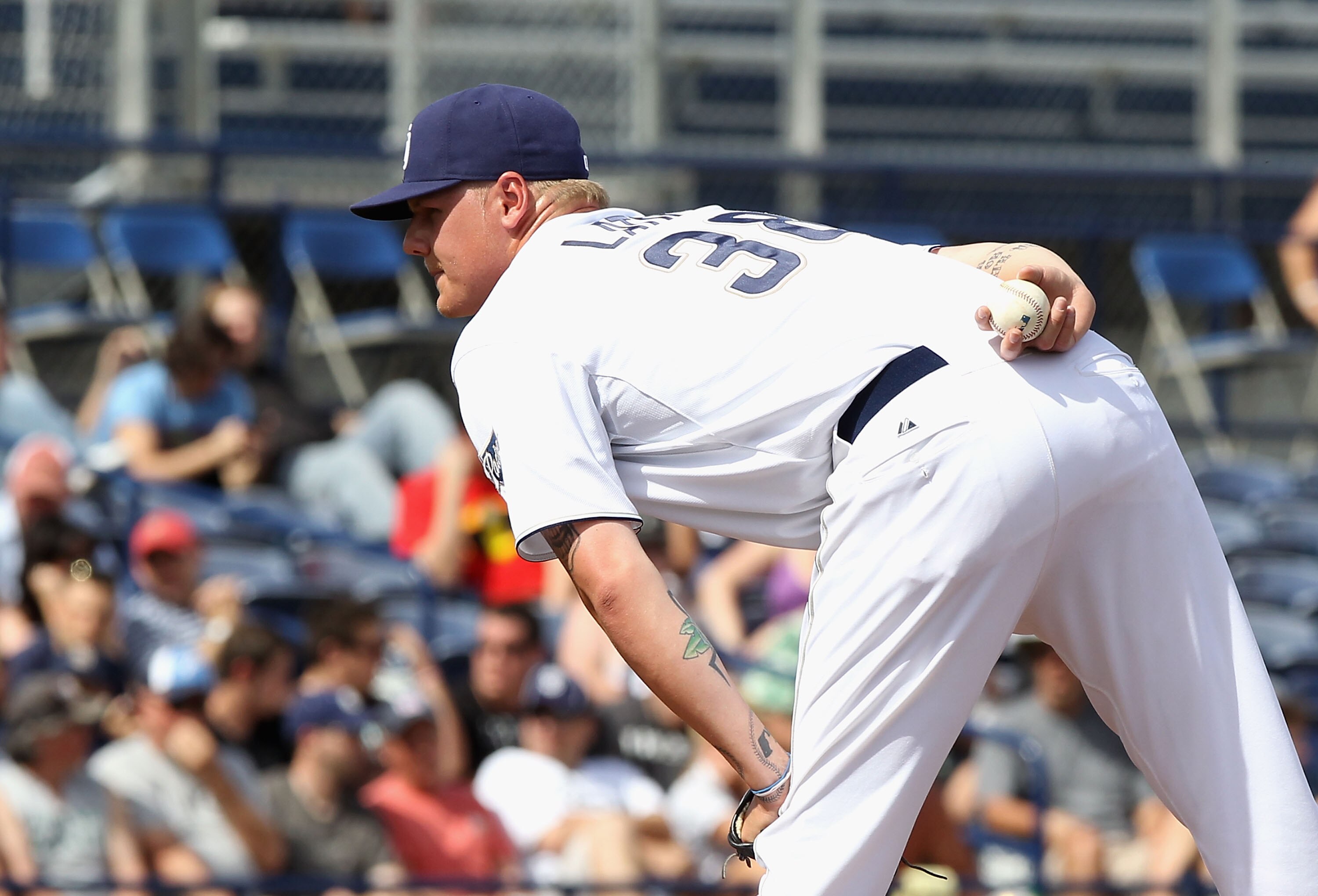 PEORIA, AZ - MARCH 06:  Starting pitcher Mat Latos #38 of the San Diego Padres pitches against the Oakland Athletics during the spring training game at Peoria Stadium on March 6, 2011 in Peoria, Arizona.  (Photo by Christian Petersen/Getty Images)