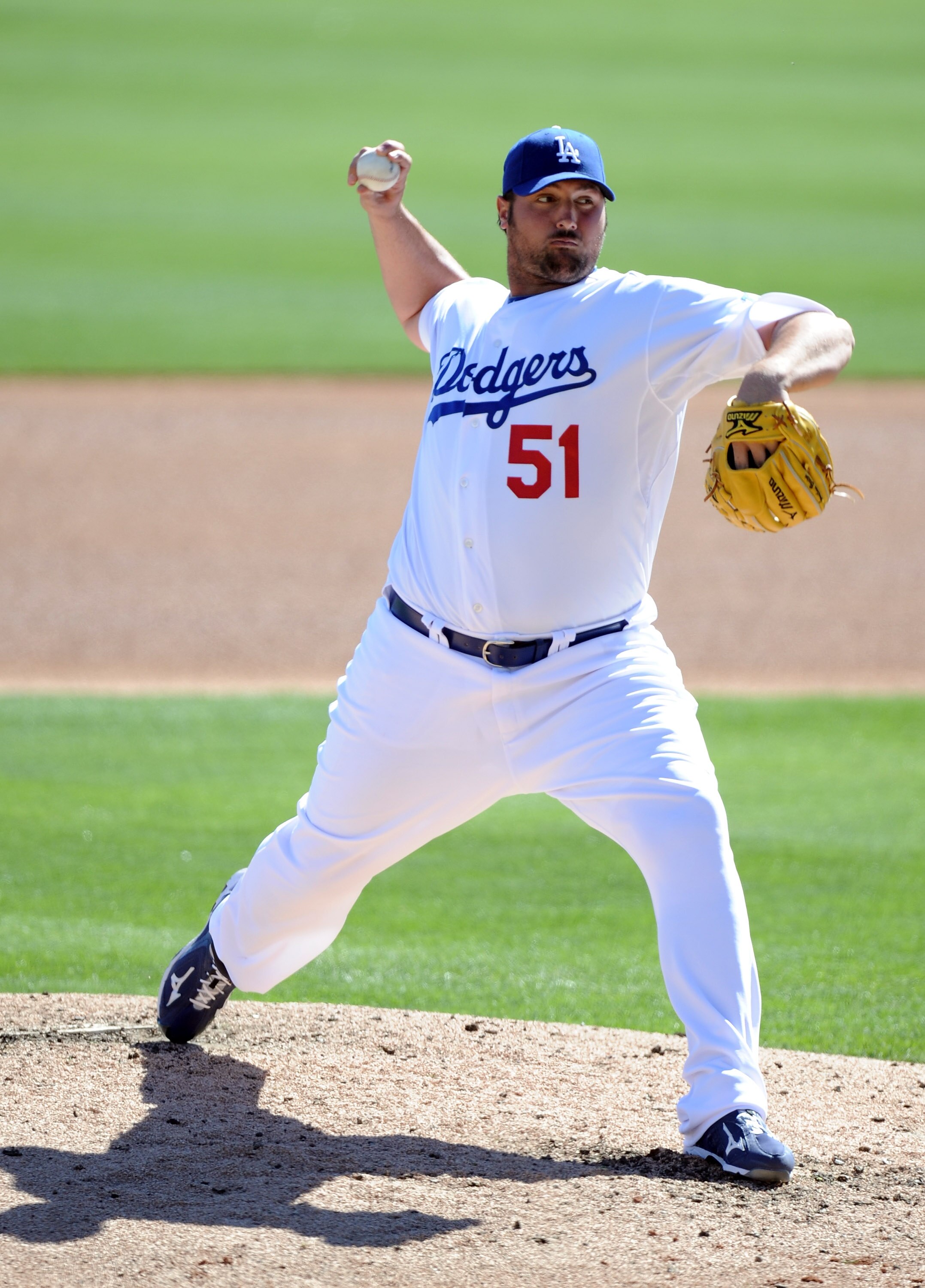 PHOENIX, AZ - FEBRUARY 28:  Jonathan Broxton #51 of the Los Angeles Dodgers pitches during spring training at Camelback Ranch on February 28, 2011 in Phoenix, Arizona.  (Photo by Harry How/Getty Images)