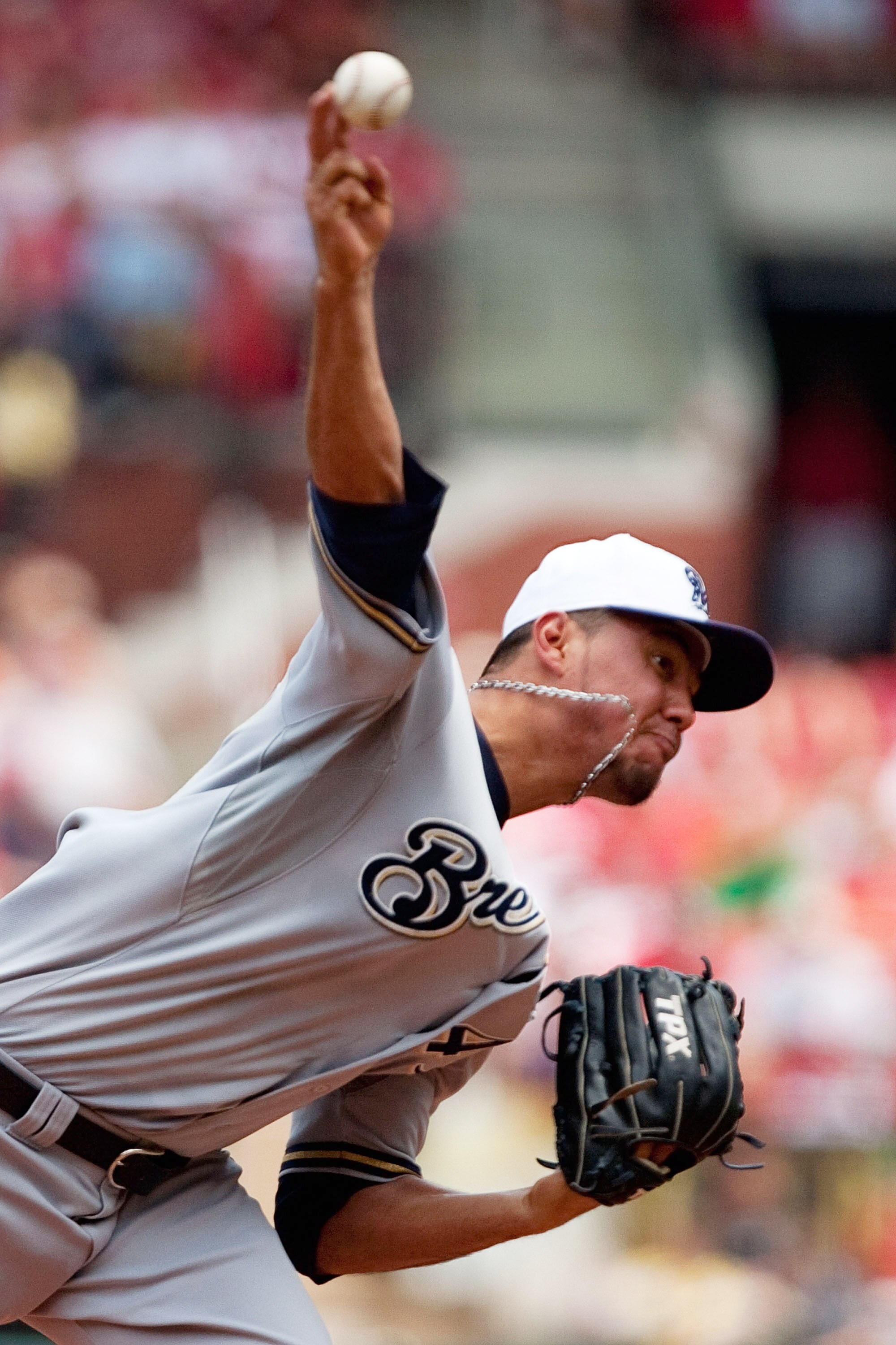 ST. LOUIS - JULY 4: Stating pitcher Yovani Gallardo #49 of the Milwaukee Brewers throws against the St. Louis Cardinals at Busch Stadium on July 4, 2010 in St. Louis, Missouri.  The Cardinals beat the Brewers 7-1.  (Photo by Dilip Vishwanat/Getty Images)