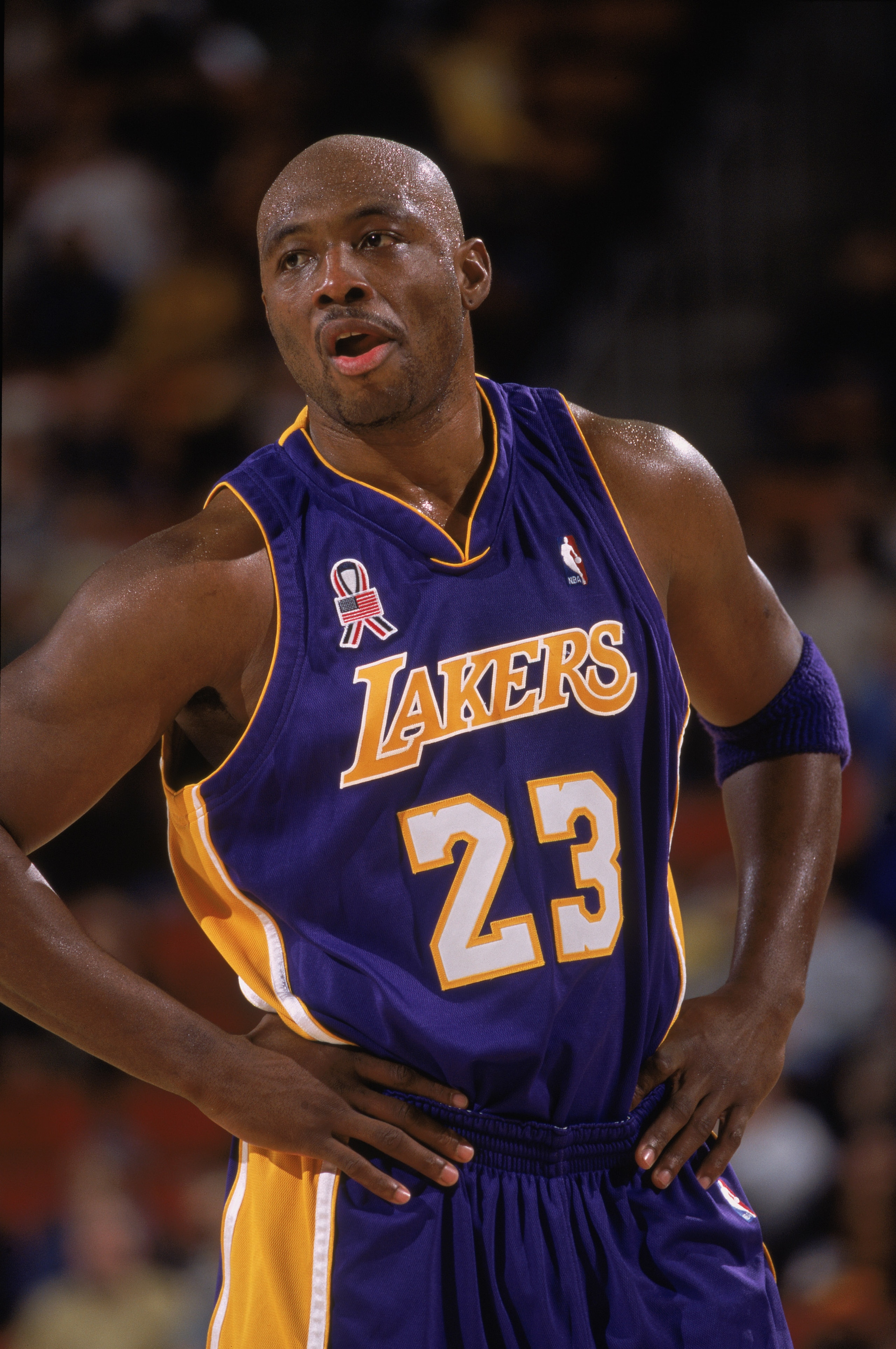 30 Nov 2001:  Portrait of guard Mitch Richmond #32 of the Los Angeles Lakers during the NBA game against the Seattle SuperSonics at Key Arena in Seattle, Washington.  The Lakers defeated the SuperSonics 107-92.  Mandatory Credit: Otto Greule/Getty Images
