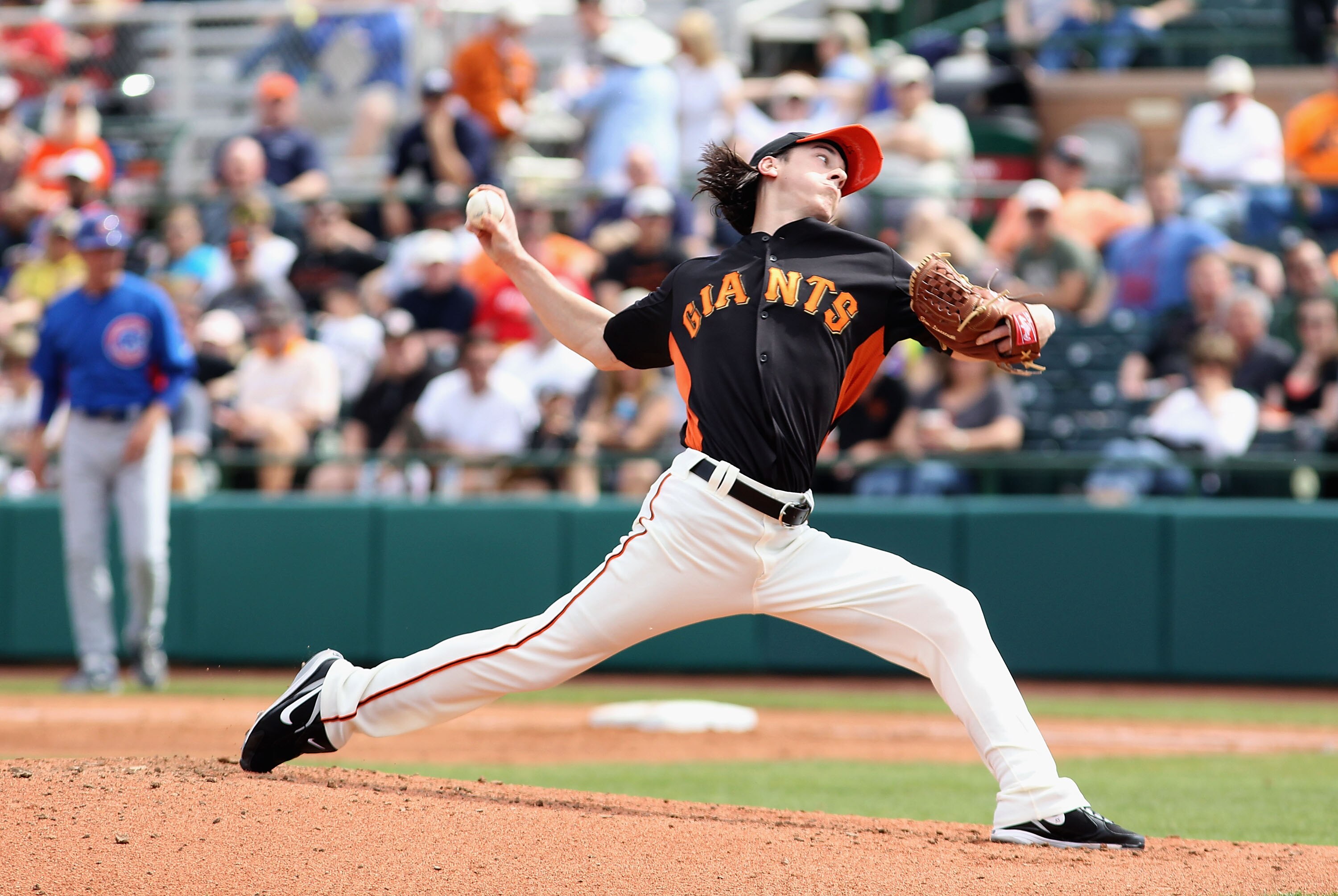 SCOTTSDALE, AZ - MARCH 01:  Starting pitcher Tim Lincecum #55 of the San Francisco Giants pitches against the Chicago Cubs during the spring training game at Scottsdale Stadium on March 1, 2011 in Scottsdale, Arizona.  (Photo by Christian Petersen/Getty I