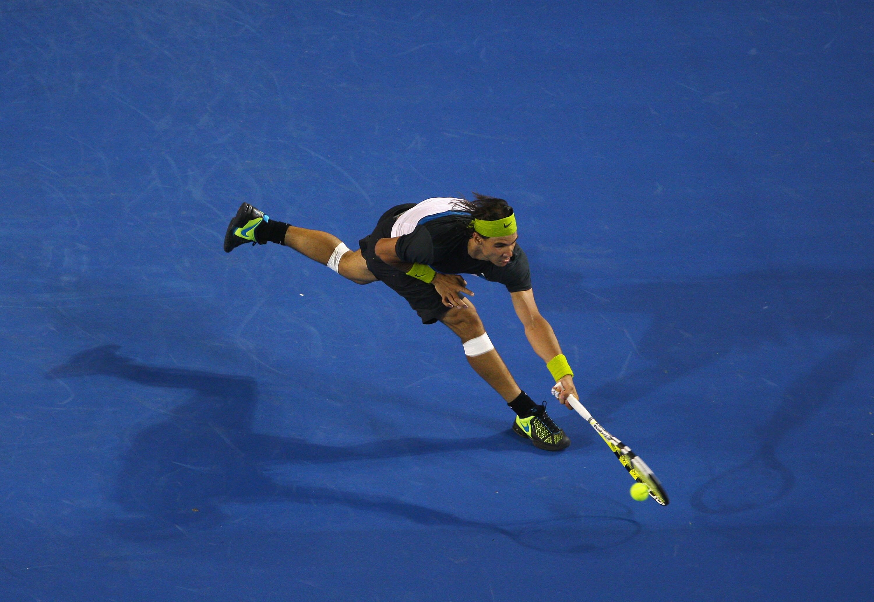 MELBOURNE, AUSTRALIA - JANUARY 30:  Rafael Nadal of Spain plays a forehand in his semifinal match against Fernando Verdasco of Spain during day twelve of the 2009 Australian Open at Melbourne Park on January 30, 2009 in Melbourne, Australia.  (Photo by Ca