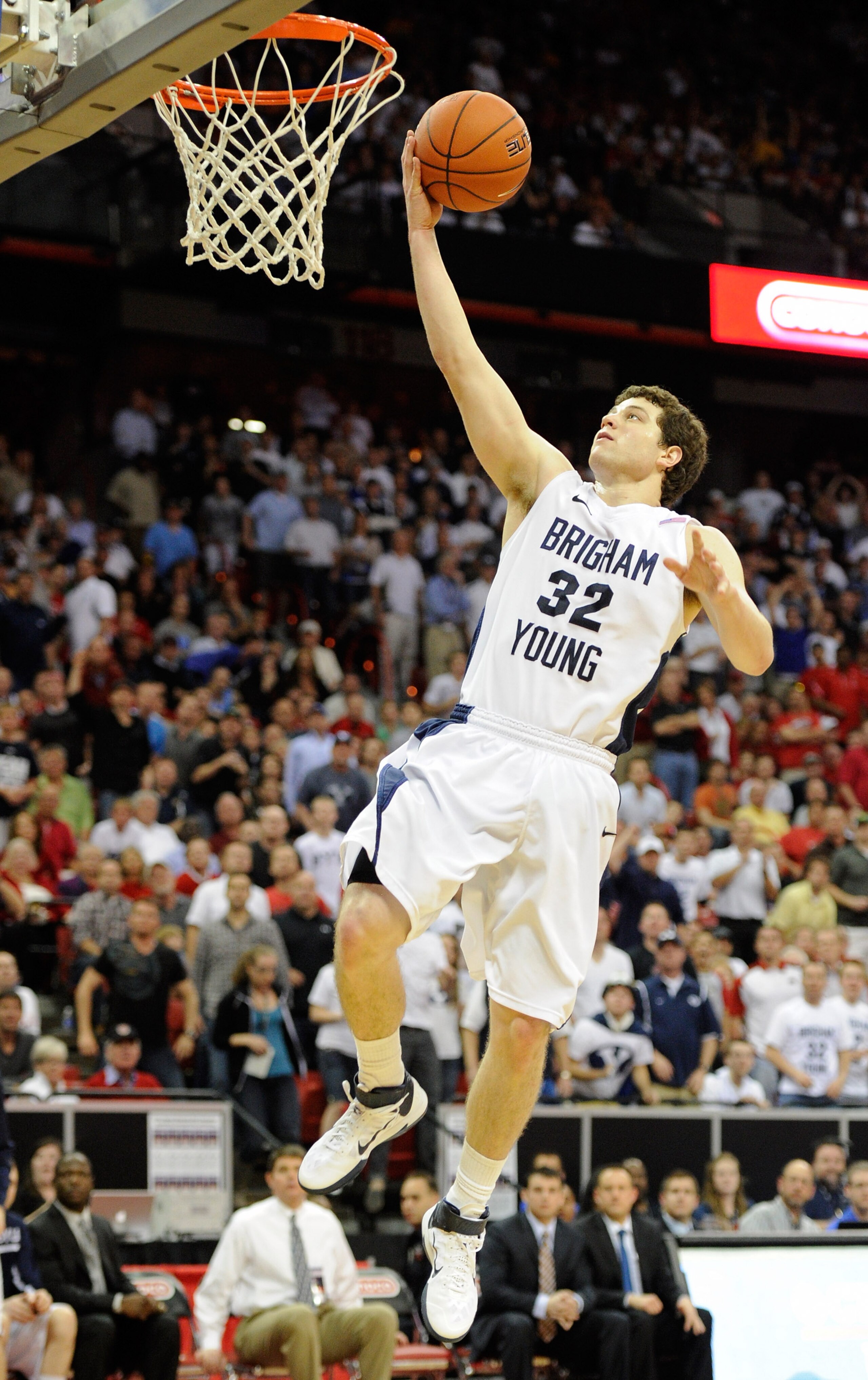 LAS VEGAS, NV - MARCH 11:  Jimmer Fredette #32 of the Brigham Young University Cougars scores a layup against the New Mexico Lobos during a semifinal game of the Conoco Mountain West Conference Basketball tournament at the Thomas & Mack Center March 11, 2