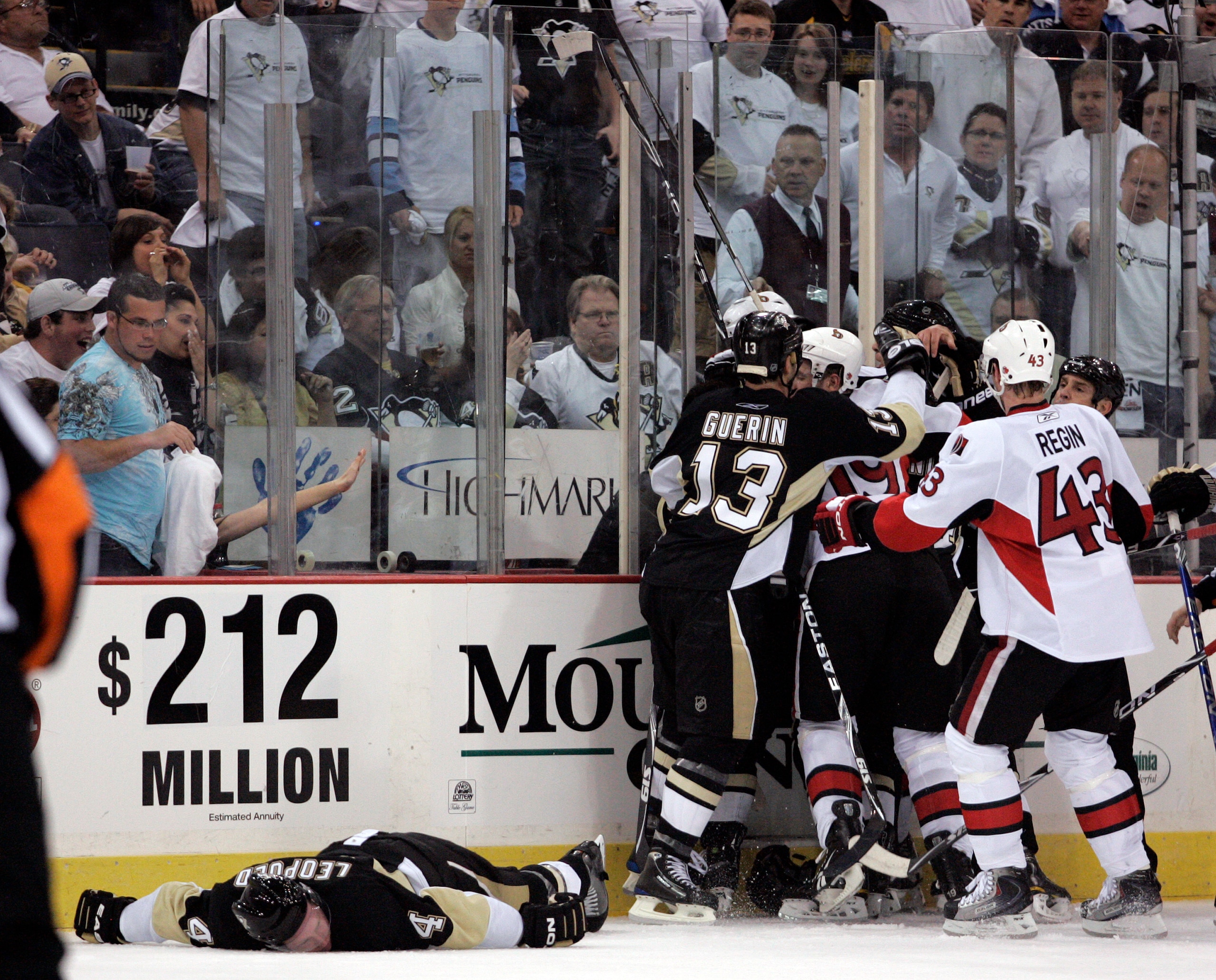 PITTSBURGH - APRIL 16:  Jordan Leopold #4 of the Pittsburgh Penguins lies motionless on the ice after taking a hit to the head against the Ottawa Senators in Game Two of the Eastern Conference Quarterfinals during the 2010 NHL Stanley Cup Playoffs at Mell