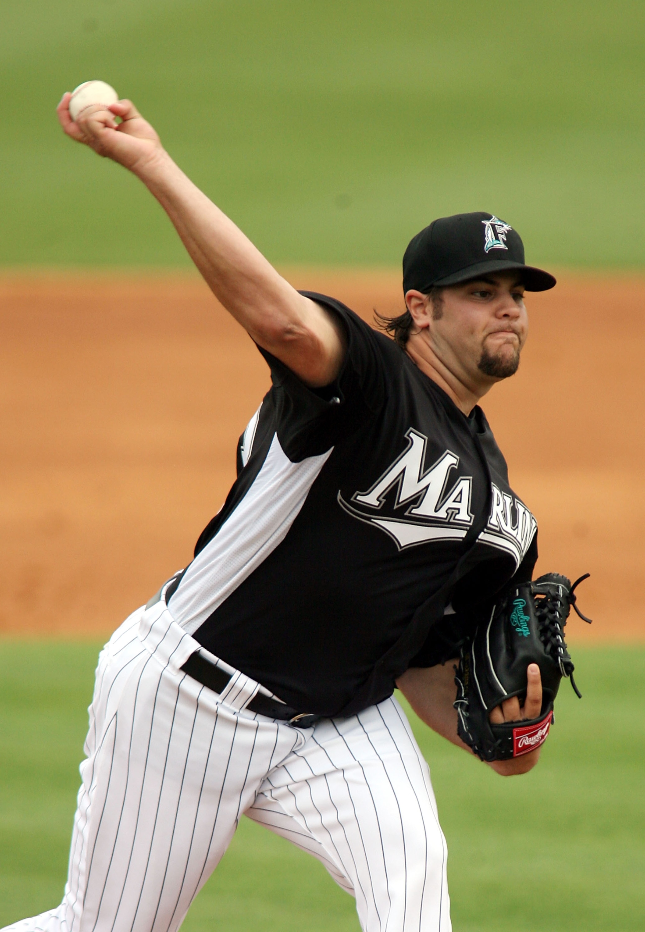JUPITER, FL - MARCH 01:  Pitcher Elih Villanueva #73  of the Florida Marlins throws against the St. Louis Cardinals at Roger Dean Stadium on March 1, 2011 in Jupiter, Florida.  (Photo by Marc Serota/Getty Images)