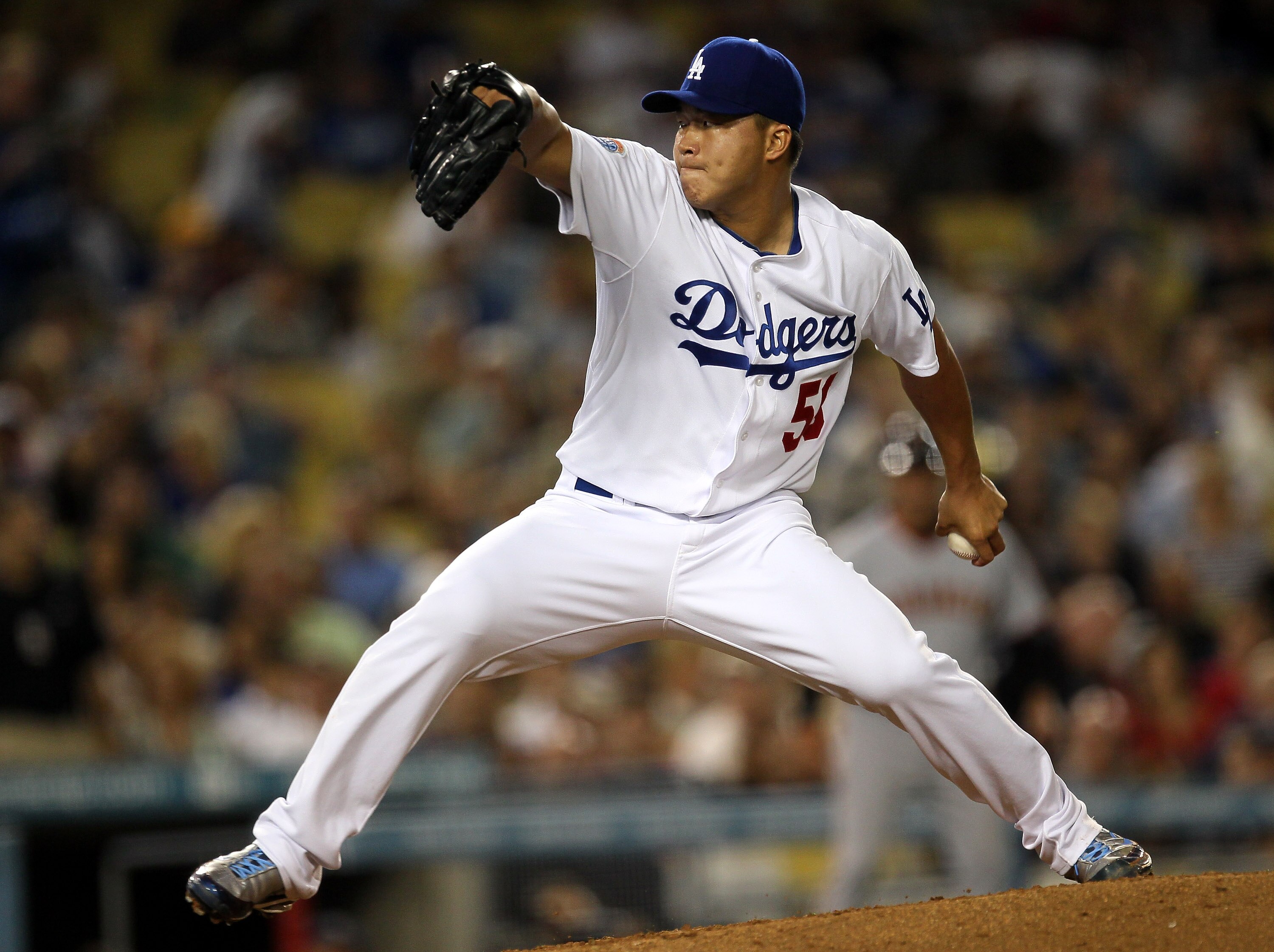 LOS ANGELES - SEPTEMBER 3:  Hong-Chih Kuo #56 of the Los Angeles Dodgers pitches the ninth inning against the San Francisco Giants on September 3, 2010 at Dodger Stadium in Los Angeles, California.  (Photo by Stephen Dunn/Getty Images)