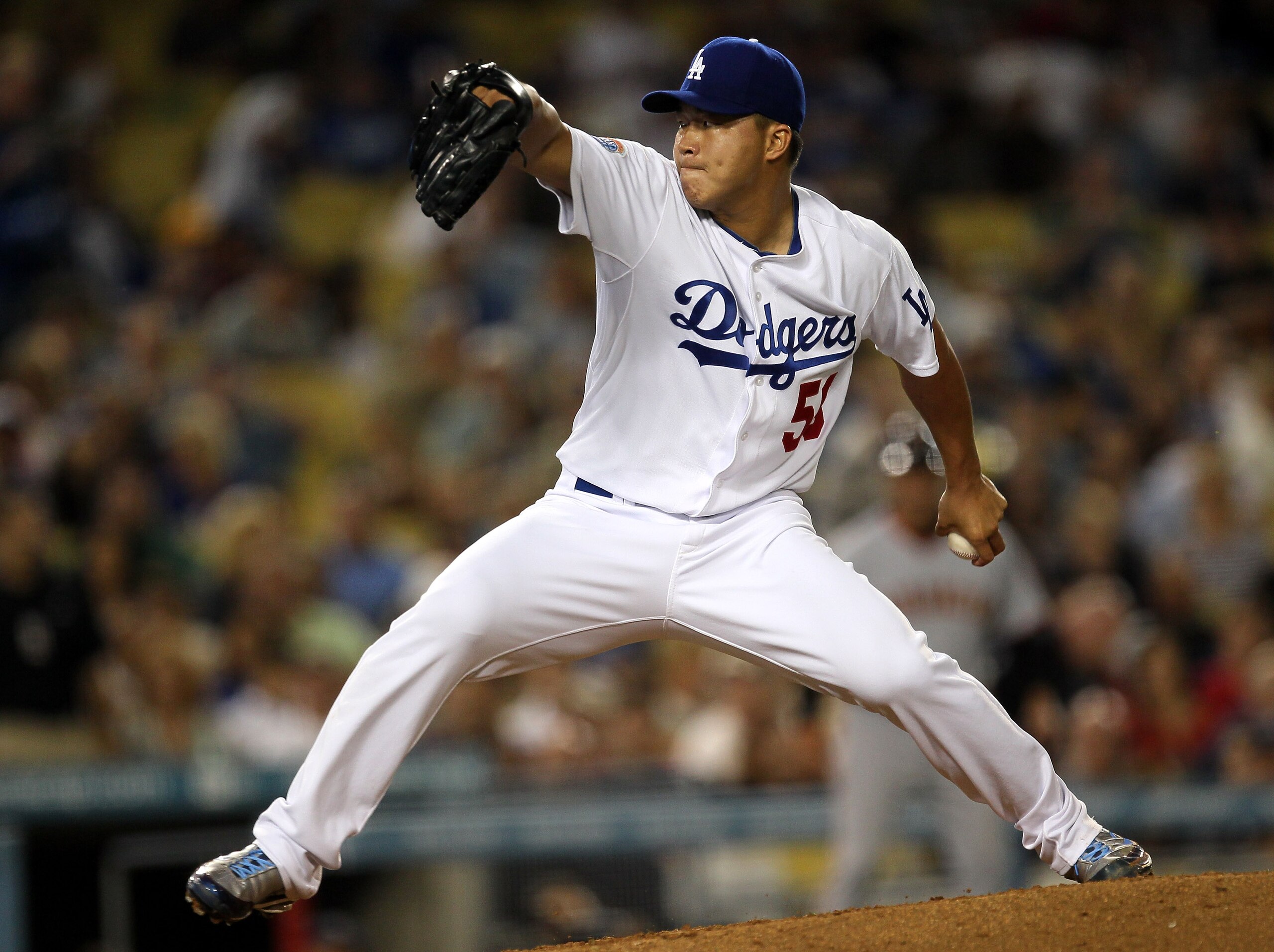 LOS ANGELES - SEPTEMBER 3: Hong-Chih Kuo #56 of the Los Angeles Dodgers pitches the ninth inning against the San Francisco Giants on September 3, 2010 at Dodger Stadium in Los Angeles, California. (Photo by Stephen Dunn/Getty Images) LOS ANGELES - SEPTEMBER 3: Hong-Chih Kuo #56 of the Los Angeles Dodgers pitches the ninth inning against the San Francisco Giants on September 3, 2010 at Dodger Stadium in Los Angeles, California. (Photo by Stephen Dunn/Getty Images)