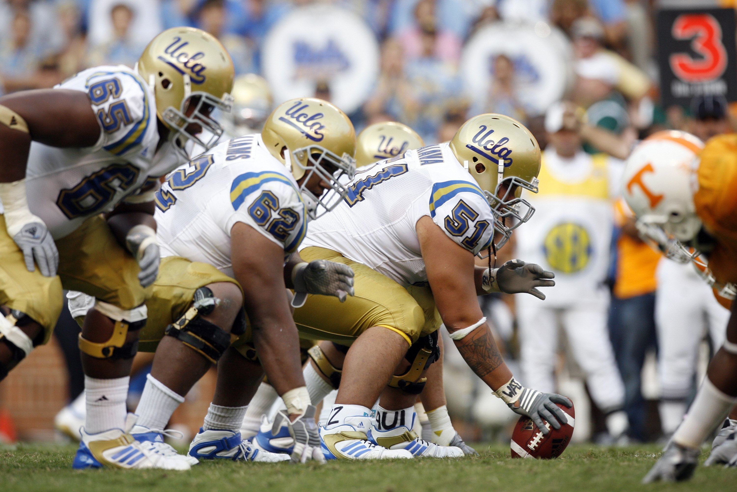 KNOXVILLE, TN - SEPTEMBER 12: Kai Maiava #51 of the UCLA Bruins is set to hike the ball against the Tennessee Volunteers on September 12, 2009 at Neyland Stadium in Knoxville, Tennessee. UCLA beat Tennessee 19-15. (Photo by Joe Murphy/Getty Images)