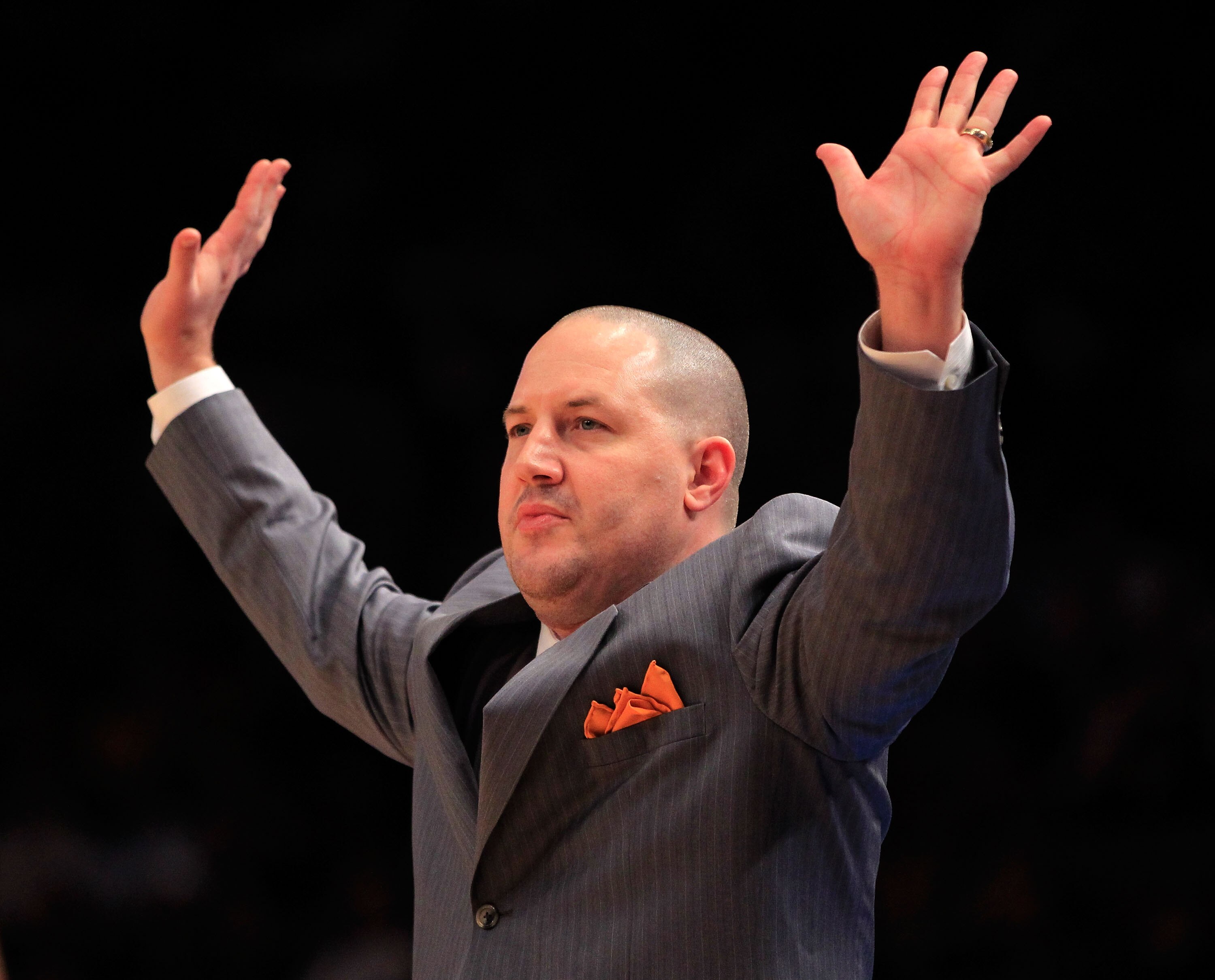 NEW YORK, NY - MARCH 10:  Head coach Buzz Williams of the Marquette Golden Eagles gestures from the bench during the game against the Louisville Cardinals during the quarterfinals of the 2011 Big East Men's Basketball Tournament presented by American Eagl