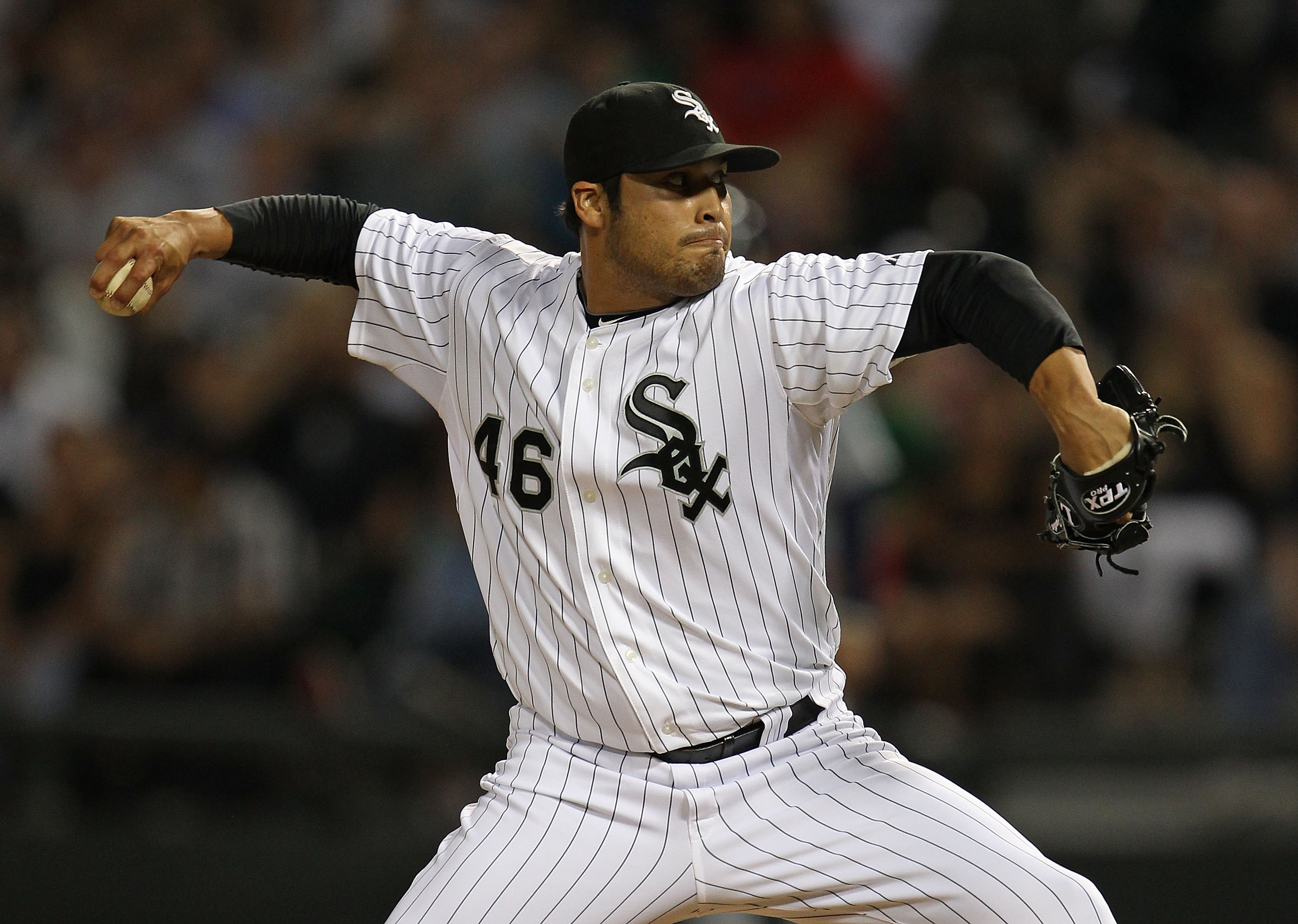 CHICAGO - JULY 26: Sergio Santos #46 of the Chicago White Sox pitches in the 9th inning against the Seattle Mariners at U.S. Cellular Field on July 26, 2010 in Chicago, Illinois. The White Sox defeated the Mariners 6-1. (Photo by Jonathan Daniel/Getty Ima