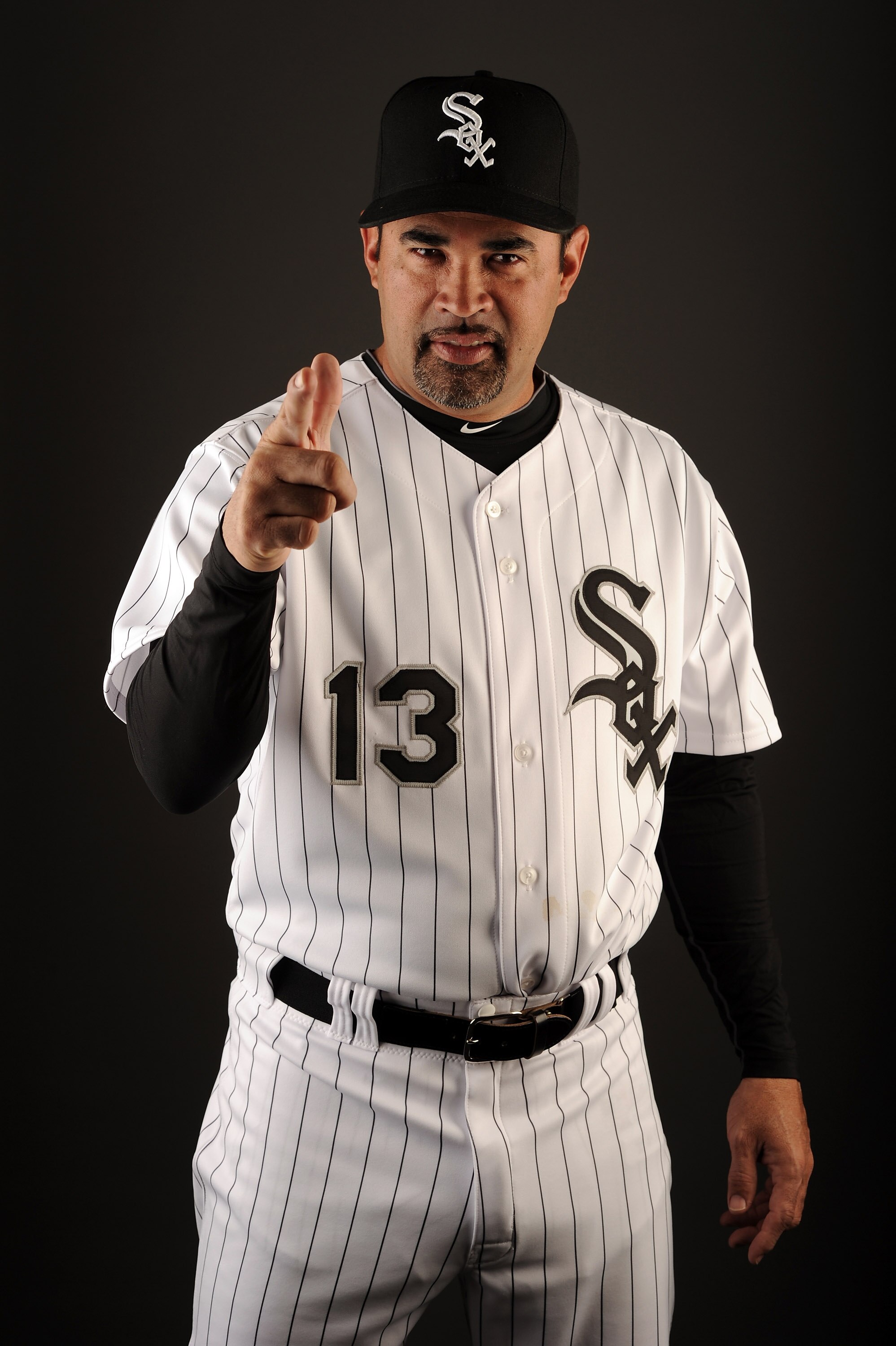 GLENDALE, AZ - FEBRUARY 26:  Manager Ozzie Guillen #13 of the Chicago White Sox poses for a photo on photo day at Camelback Ranch on February 26, 2011 in Glendale, Arizona.  (Photo by Harry How/Getty Images)