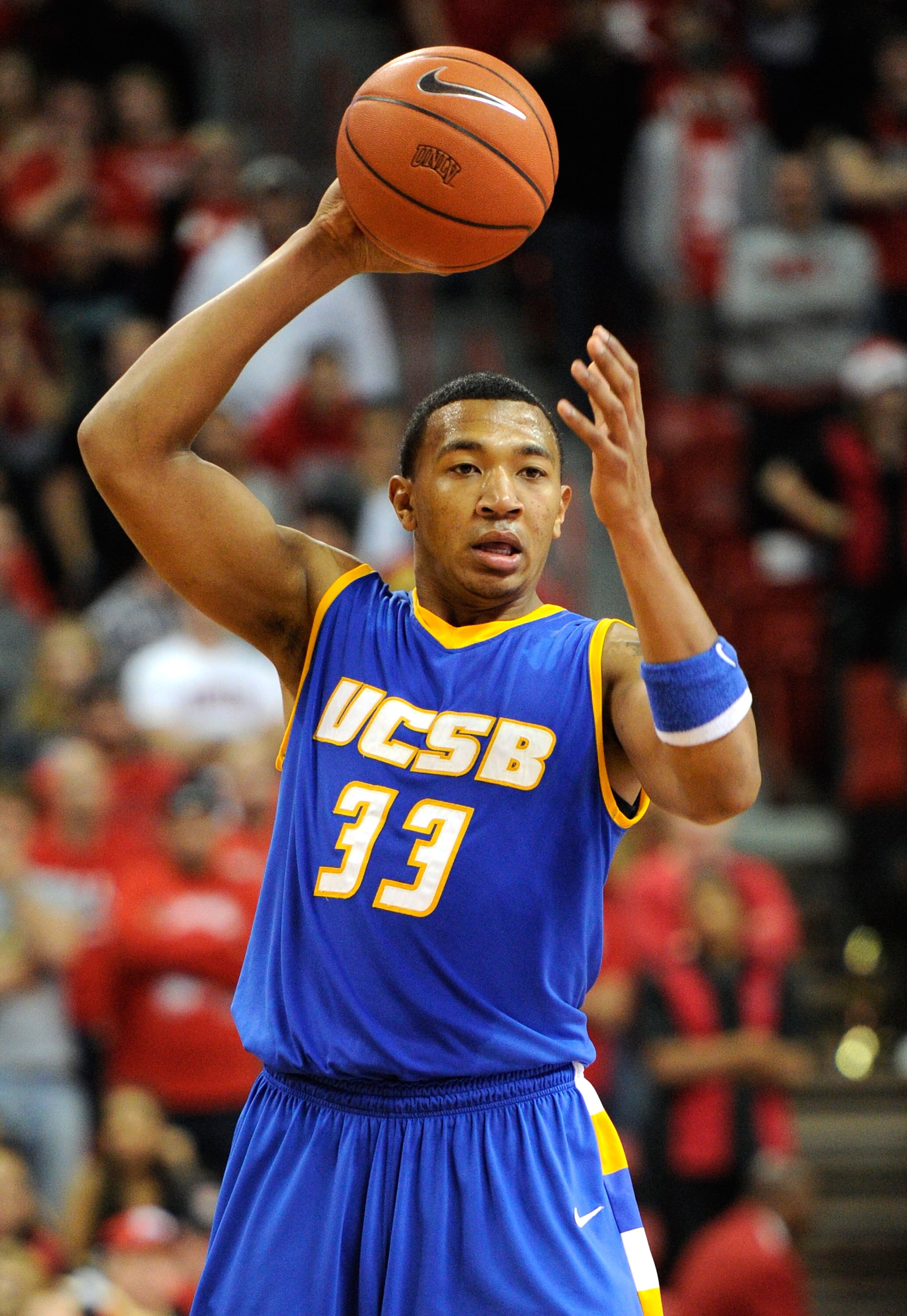 LAS VEGAS, NV - DECEMBER 15:  Orlando Johnson #33 of the UC Santa Barbara Gauchos looks to pass against the UNLV Rebels during their game at the Thomas & Mack Center December 15, 2010 in Las Vegas, Nevada. UC Santa Barbara won 68-62.  (Photo by Ethan Mill