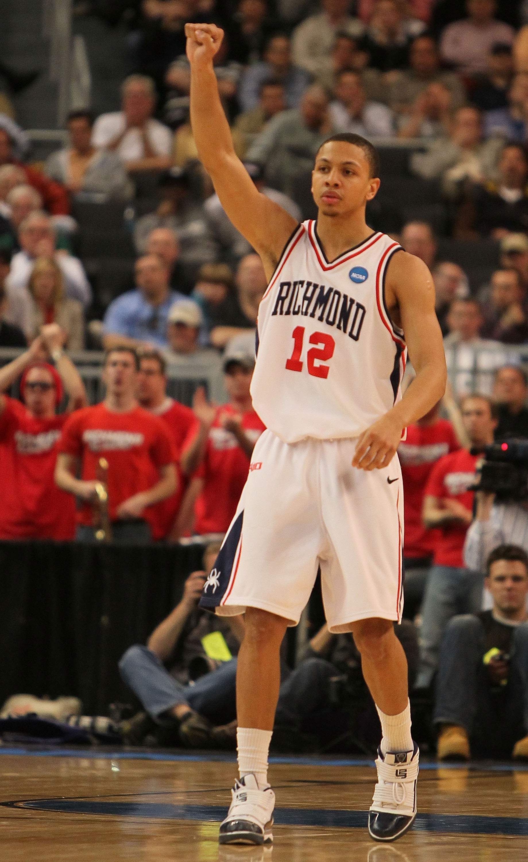 PROVIDENCE, RI - MARCH 18: Kevin Smith #12 of the Richmond Spiders reacts the Saint Mary's Gaels during the first round of the 2010 NCAA men's basketball tournament at Dunkin' Donuts Center on March 18, 2010 in Providence, Rhode Island. (Jim Rogash/Getty PROVIDENCE, RI - MARCH 18: Kevin Smith #12 of the Richmond Spiders reacts the Saint Mary's Gaels during the first round of the 2010 NCAA men's basketball tournament at Dunkin' Donuts Center on March 18, 2010 in Providence, Rhode Island. (Jim Rogash/Getty