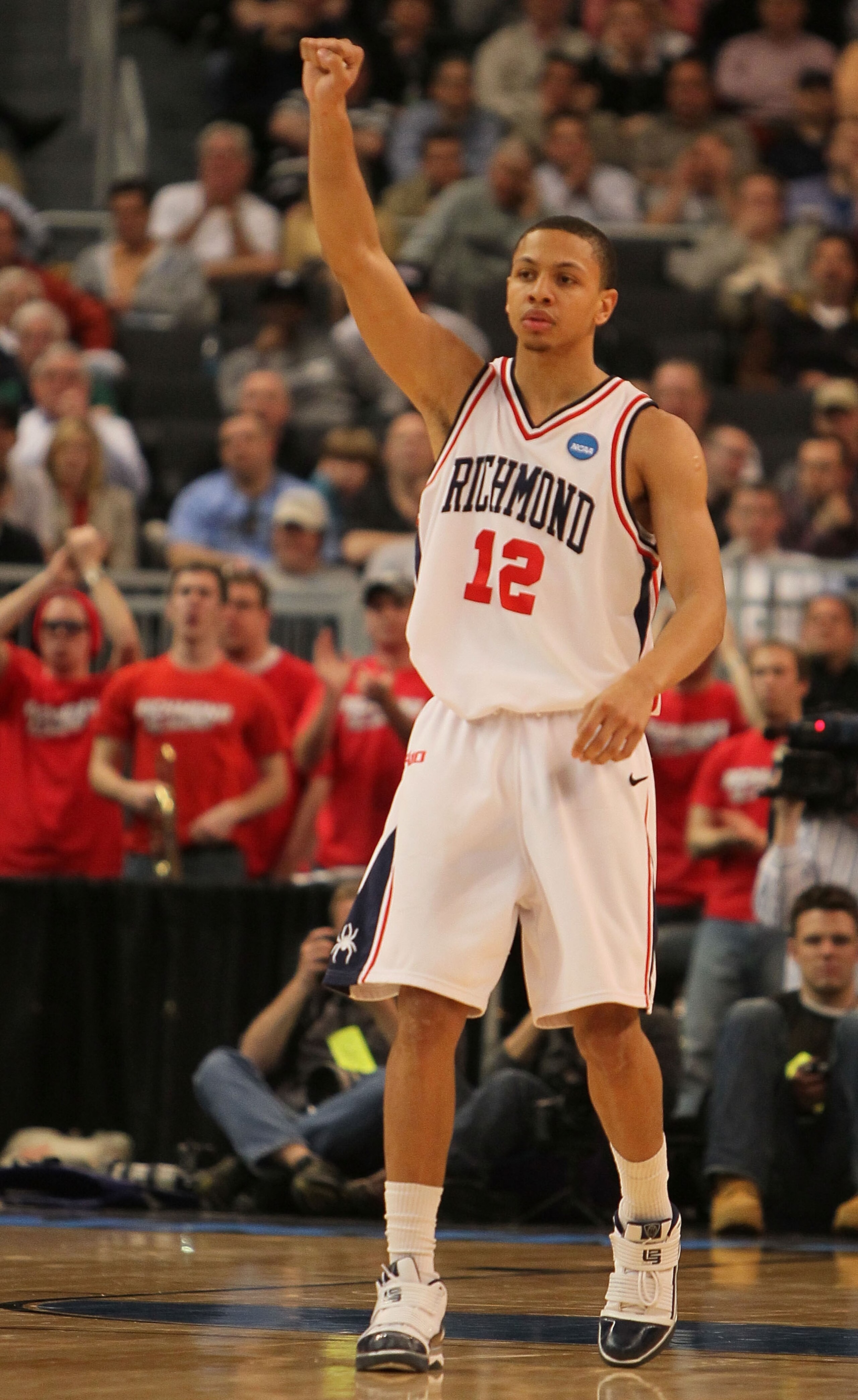 PROVIDENCE, RI - MARCH 18: Kevin Smith #12 of the Richmond Spiders reacts the Saint Mary's Gaels during the first round of the 2010 NCAA men's basketball tournament at Dunkin' Donuts Center on March 18, 2010 in Providence, Rhode Island. (Jim Rogash/Getty PROVIDENCE, RI - MARCH 18: Kevin Smith #12 of the Richmond Spiders reacts the Saint Mary's Gaels during the first round of the 2010 NCAA men's basketball tournament at Dunkin' Donuts Center on March 18, 2010 in Providence, Rhode Island. (Jim Rogash/Getty