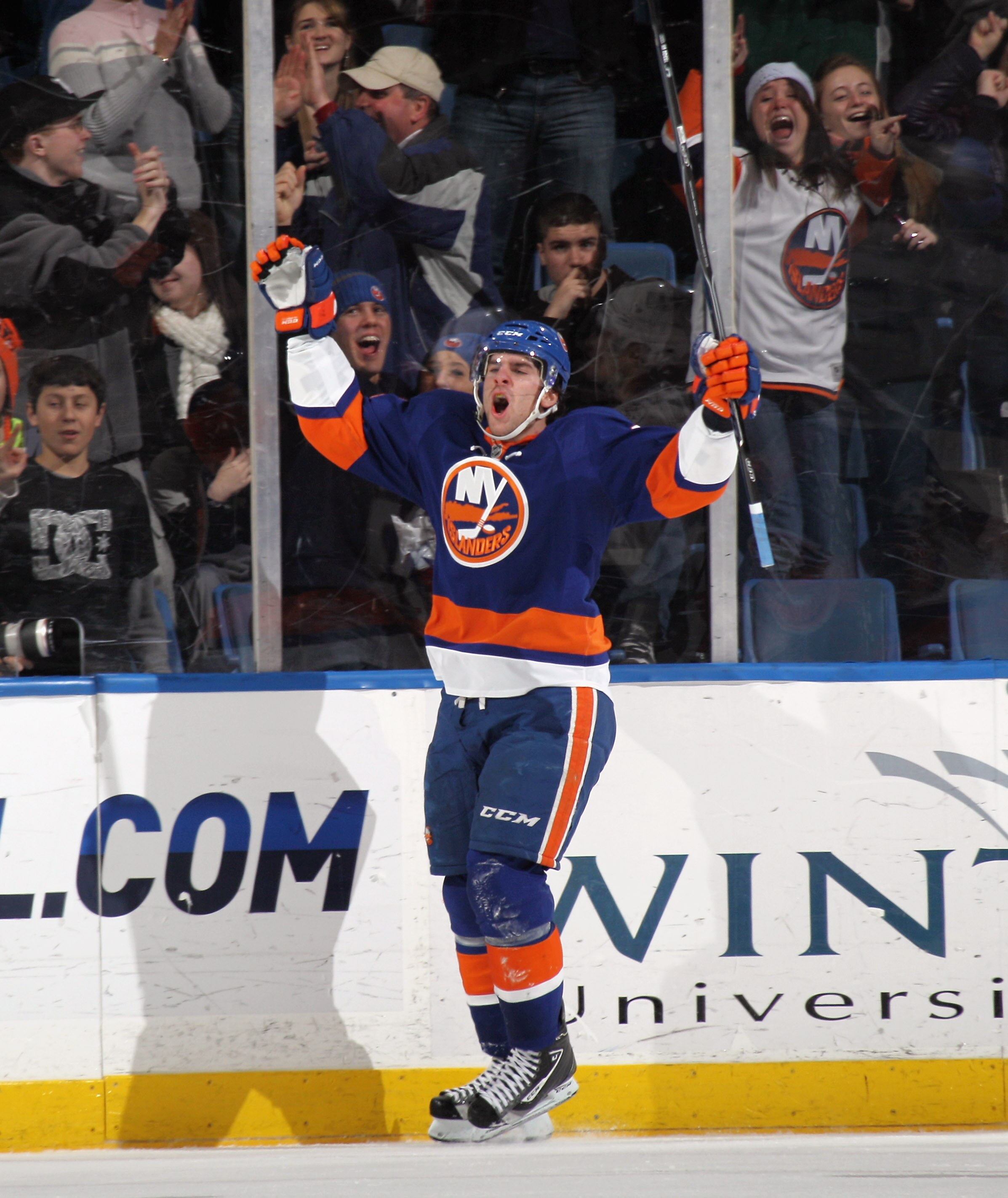 UNIONDALE, NY - DECEMBER 22: John Tavares #91 of the New York Islanders scores the winning goal in overtime against the Tampa Bay Lightning at the Nassau Coliseum on December 22, 2010 in Uniondale, New York.  (Photo by Bruce Bennett/Getty Images)