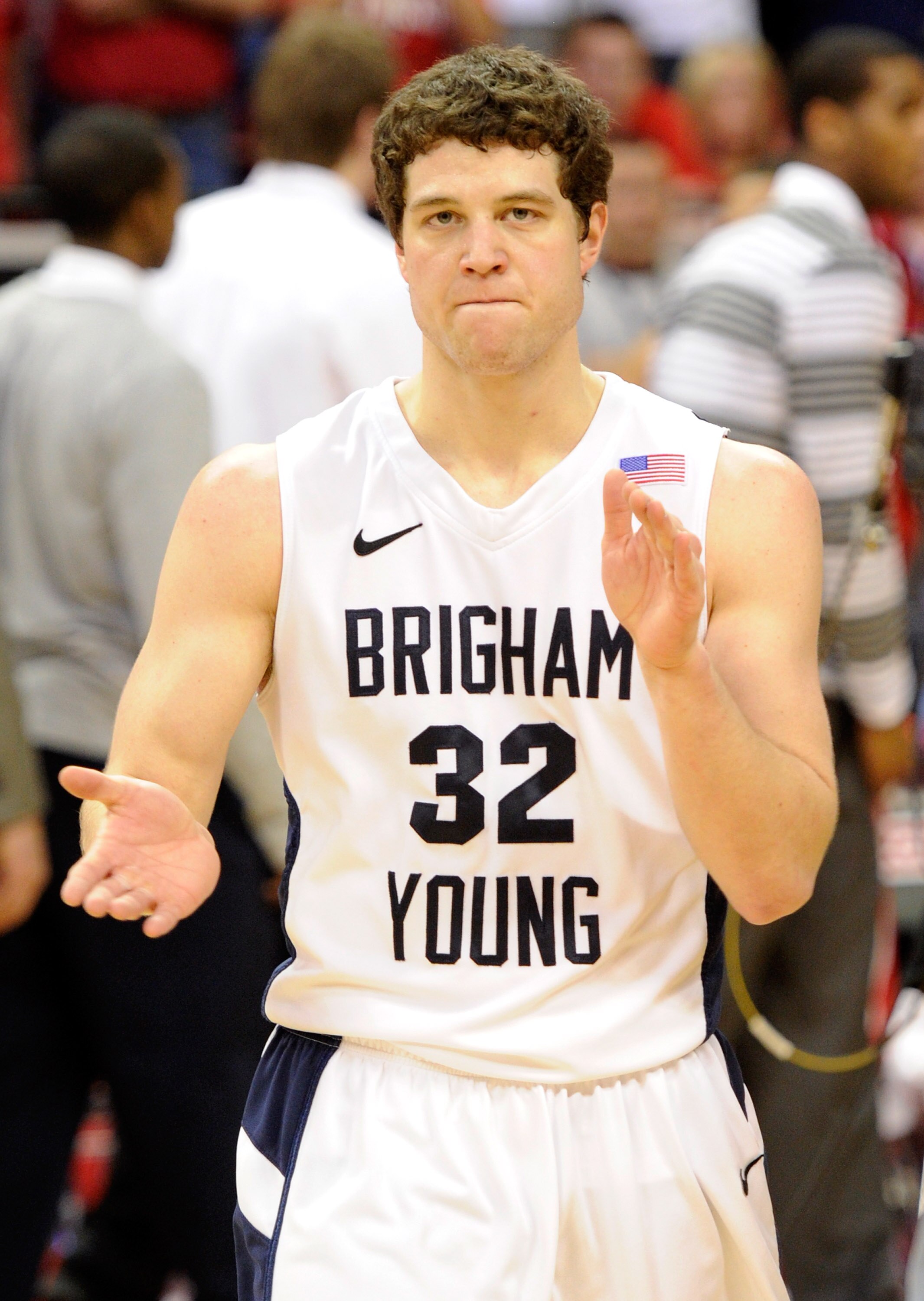 LAS VEGAS, NV - MARCH 11:  Jimmer Fredette #32 of the Brigham Young University Cougars claps after he scored 52 points in the team's 87-76 victory over the New Mexico Lobos in a semifinal game of the Conoco Mountain West Conference Basketball tournament a