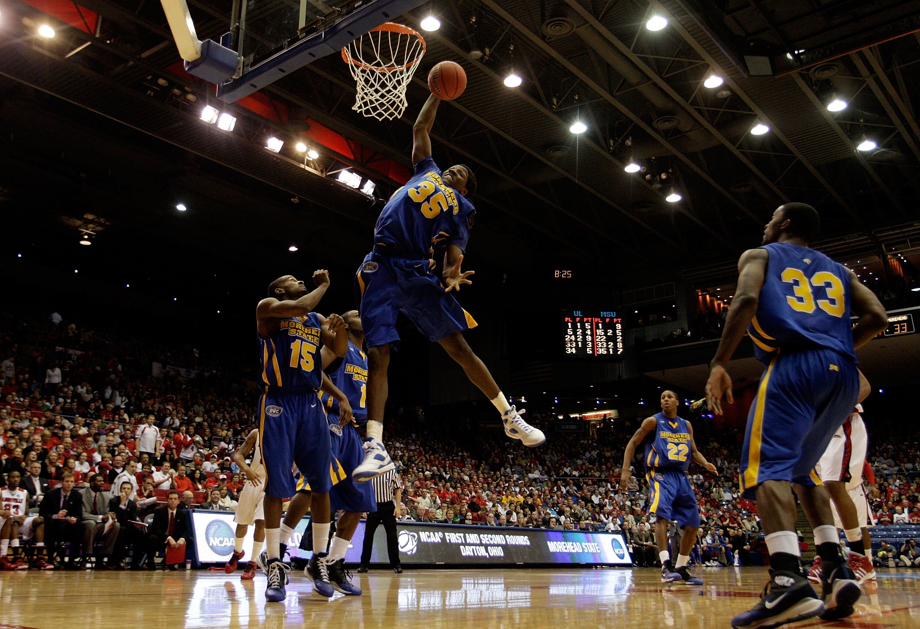 DAYTON, OH - MARCH 20: Kenneth Faried #35 of the Morehead State Eagles gets a rebound against the Louisville Cardinals during the first round of the NCAA Division I Men's Basketball Tournament at the University of Dayton Arena on March 20, 2009 in Dayton, DAYTON, OH - MARCH 20: Kenneth Faried #35 of the Morehead State Eagles gets a rebound against the Louisville Cardinals during the first round of the NCAA Division I Men's Basketball Tournament at the University of Dayton Arena on March 20, 2009 in Dayton,