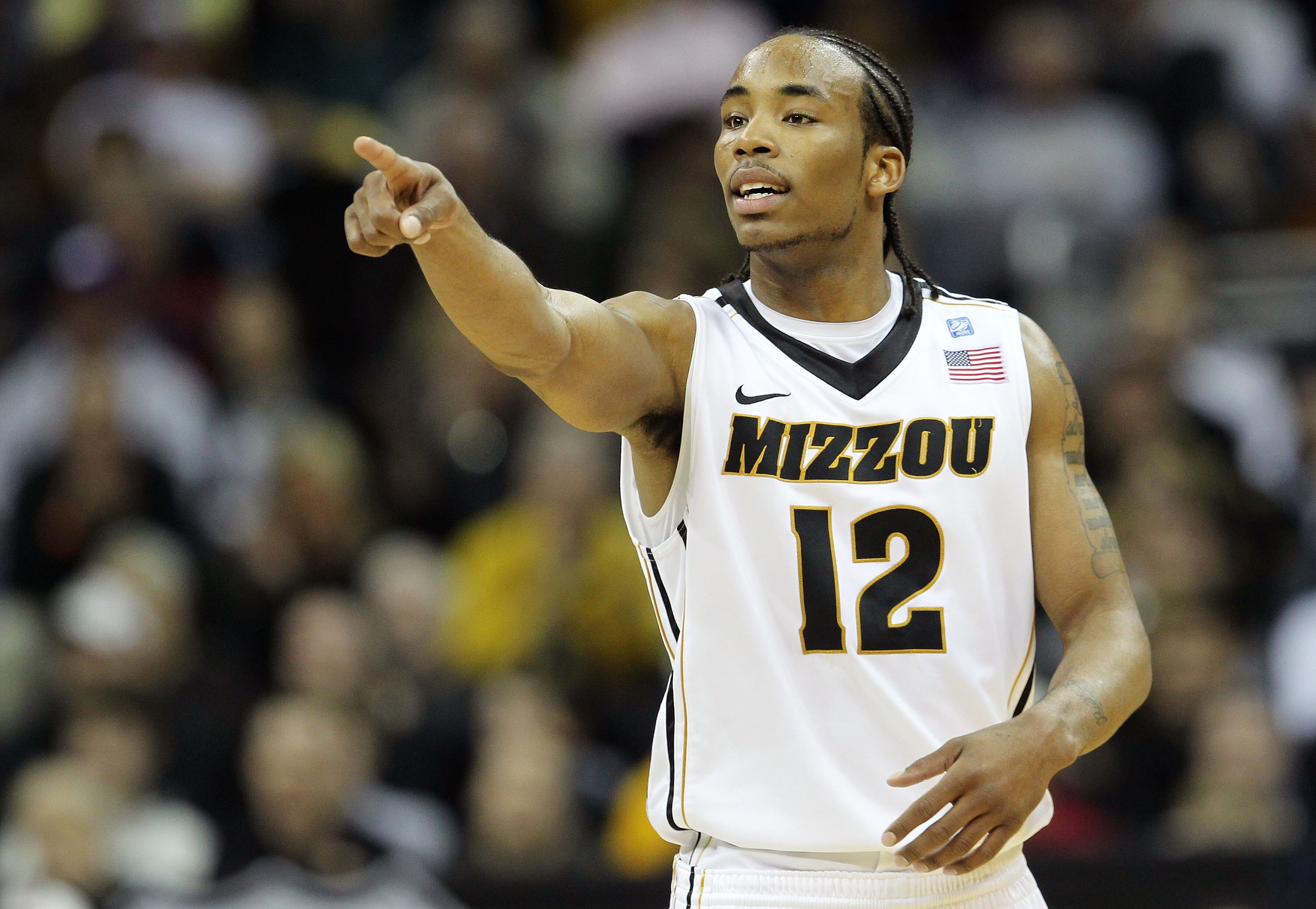 KANSAS CITY, MO - MARCH 09: Marcus Denmon #12 of the Missouri Tigers signals against the Texas Tech Red Raiders during their first round game in the 2011 Phillips 66 Big 12 Men's Basketball Tournament at Sprint Center on March 9, 2011 in Kansas City, Mis KANSAS CITY, MO - MARCH 09: Marcus Denmon #12 of the Missouri Tigers signals against the Texas Tech Red Raiders during their first round game in the 2011 Phillips 66 Big 12 Men's Basketball Tournament at Sprint Center on March 9, 2011 in Kansas City, Mis