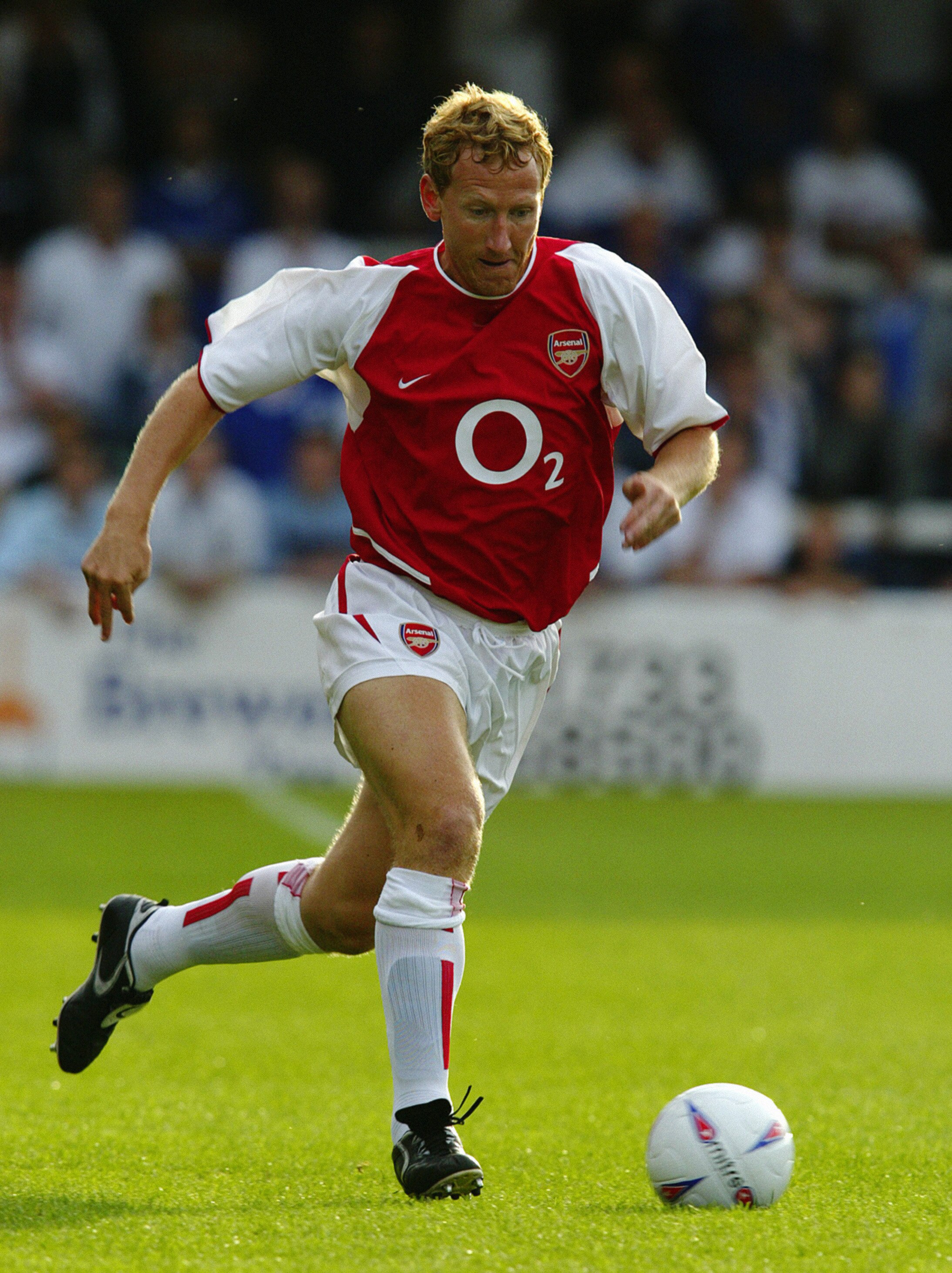 PETERBOROUGH - JULY 11:  Ray Parlour of Arsenal runs with the ball during the Pre-Season Friendly match between Peterborough United and Arsenal held on July 11, 2003 at London Road, in Peterborough, England. Peterborough United won the match 1-0. (Photo b