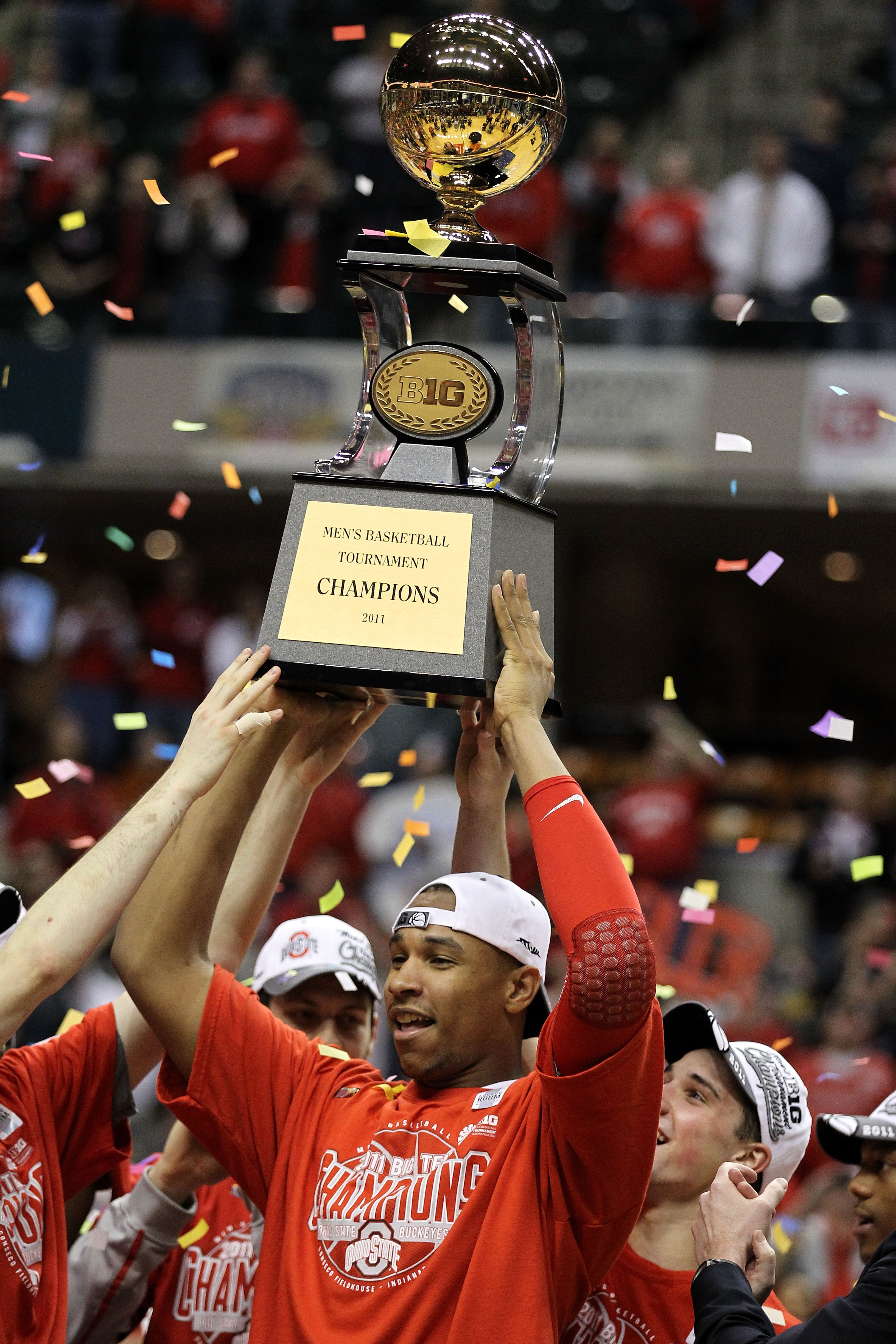 INDIANAPOLIS, IN - MARCH 13:  Jared Sullinger #0 of the Ohio State Buckeyes celebrates with the Big Ten Championship trophy after OHio State won 71-60 against the Penn State Nittany Lions during the championship game of the 2011 Big Ten Men's Basketball T
