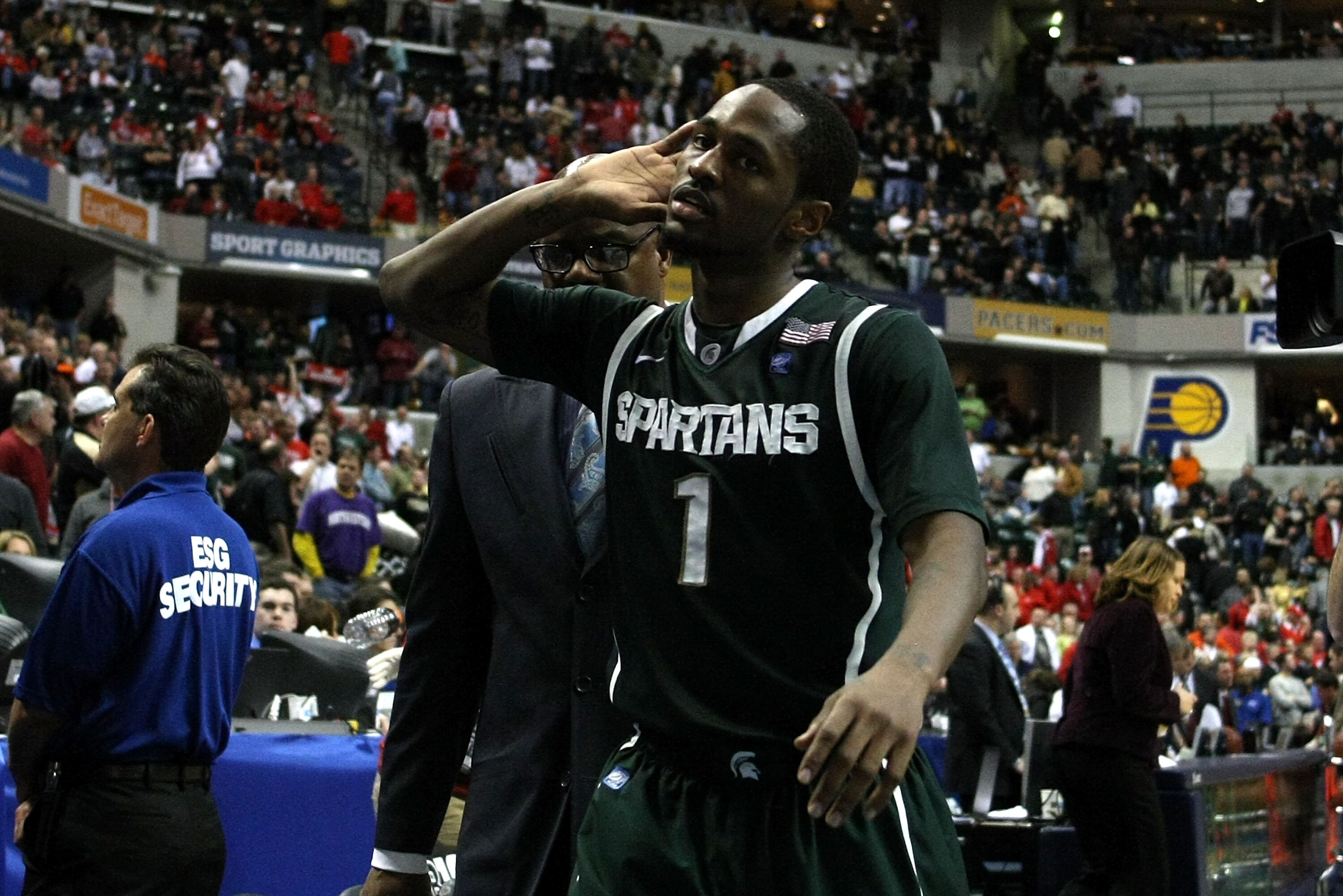 INDIANAPOLIS, IN - MARCH 11: Kalin Lucas #1 of the Michigan State Spartans calls on the fans as he wals off the court after Michigan State won 74-56 against the Purdue Boilermakers during the quarterfinals of the 2011 Big Ten Men's Basketball Tournament INDIANAPOLIS, IN - MARCH 11: Kalin Lucas #1 of the Michigan State Spartans calls on the fans as he wals off the court after Michigan State won 74-56 against the Purdue Boilermakers during the quarterfinals of the 2011 Big Ten Men's Basketball Tournament