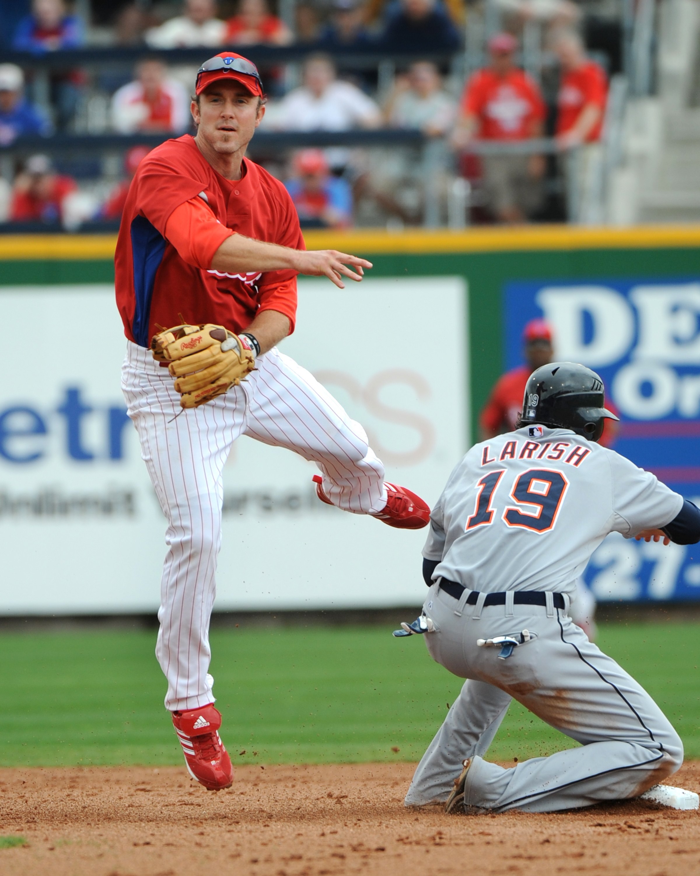 CLEARWATER, FL - MARCH 11: Infielder Chase Utley #26 of the  Philadelphia Phillies starts a double play against the Detroit Tigers March 11, 2010 at the Bright House Field in Clearwater, Florida. (Photo by Al Messerschmidt/Getty Images)
