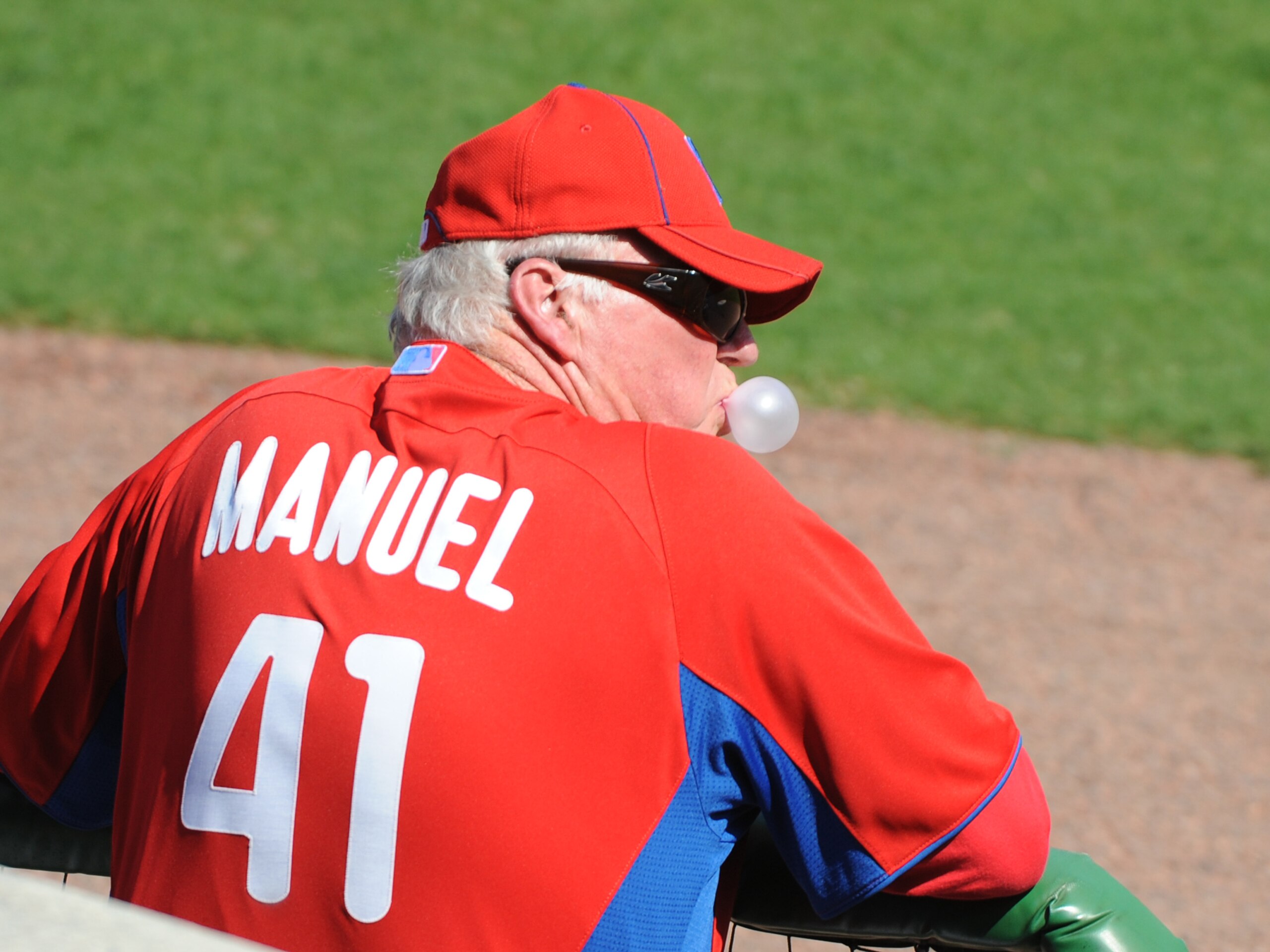 CLEARWATER, FL - FEBRUARY 24: Manager Charlie Manuel #41 of the Philadelphia Phillies blows a bubble and watches play against the Florida State Seminoles February 24, 2011 at Bright House Field in Clearwater, Florida. (Photo by Al Messerschmidt/Getty Im CLEARWATER, FL - FEBRUARY 24: Manager Charlie Manuel #41 of the Philadelphia Phillies blows a bubble and watches play against the Florida State Seminoles February 24, 2011 at Bright House Field in Clearwater, Florida. (Photo by Al Messerschmidt/Getty Im