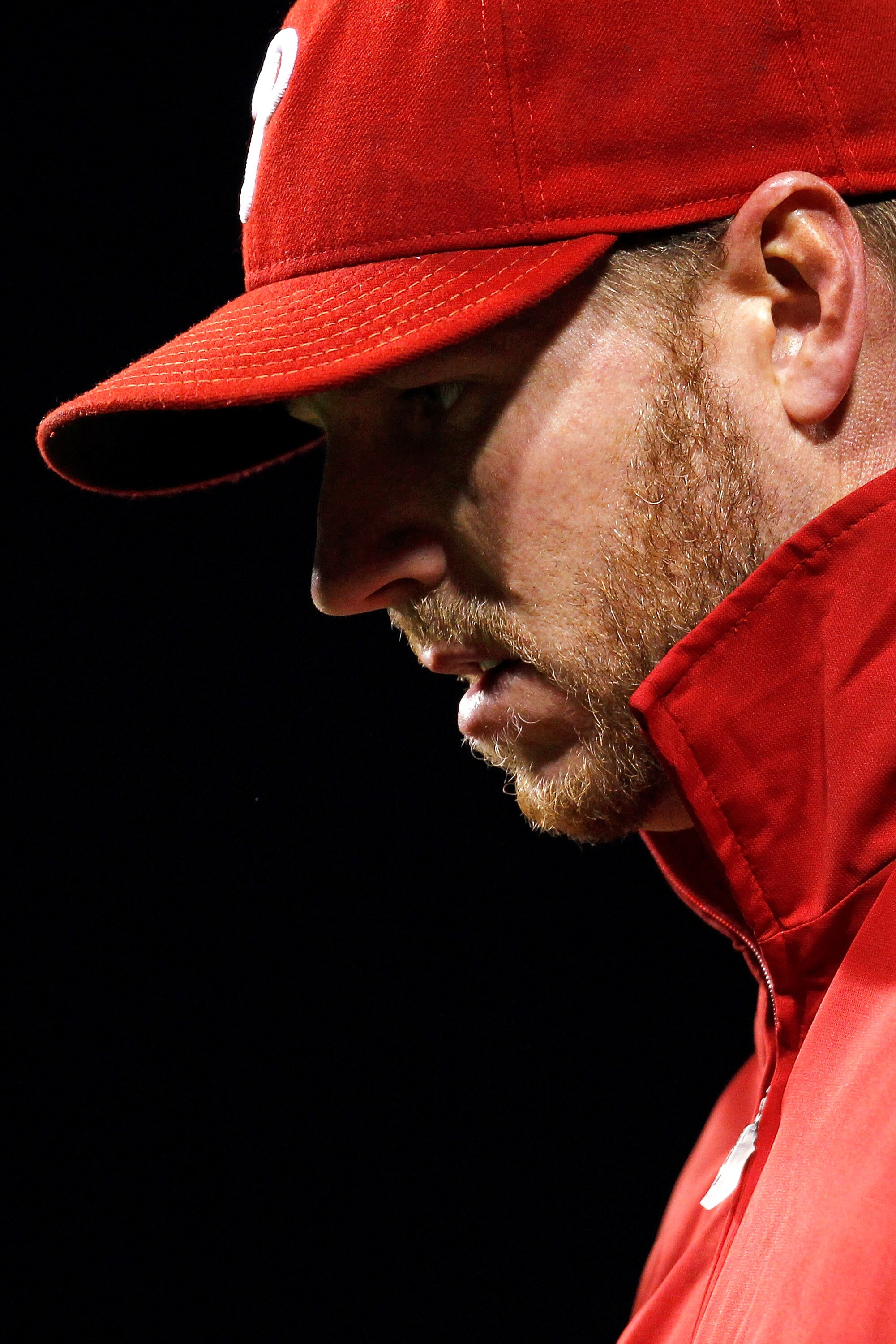 PHILADELPHIA - OCTOBER 16:  Roy Halladay #34 of the Philadelphia Phillies looks down against the San Francisco Giants in Game One of the NLCS during the 2010 MLB Playoffs at Citizens Bank Park on October 16, 2010 in Philadelphia, Pennsylvania.  (Photo by 
