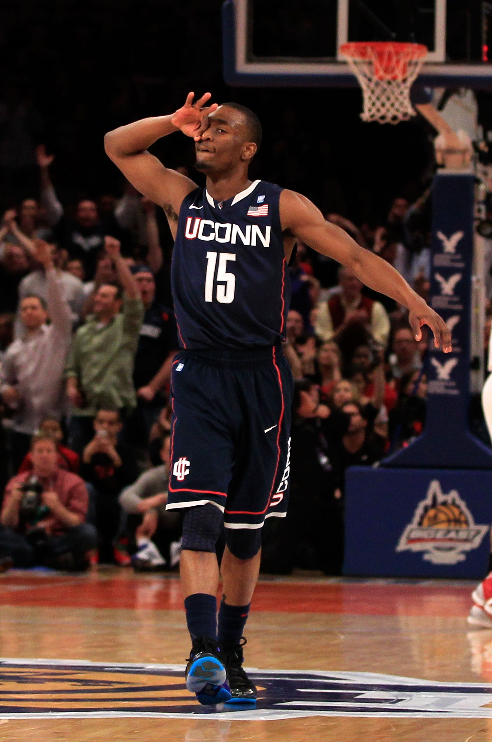 NEW YORK, NY - MARCH 12:  Kemba Walker #15 of the Connecticut Huskies reacts after a play against the Louisville Cardinals during the championship of the 2011 Big East Men's Basketball Tournament presented by American Eagle Outfitters at Madison Square Ga