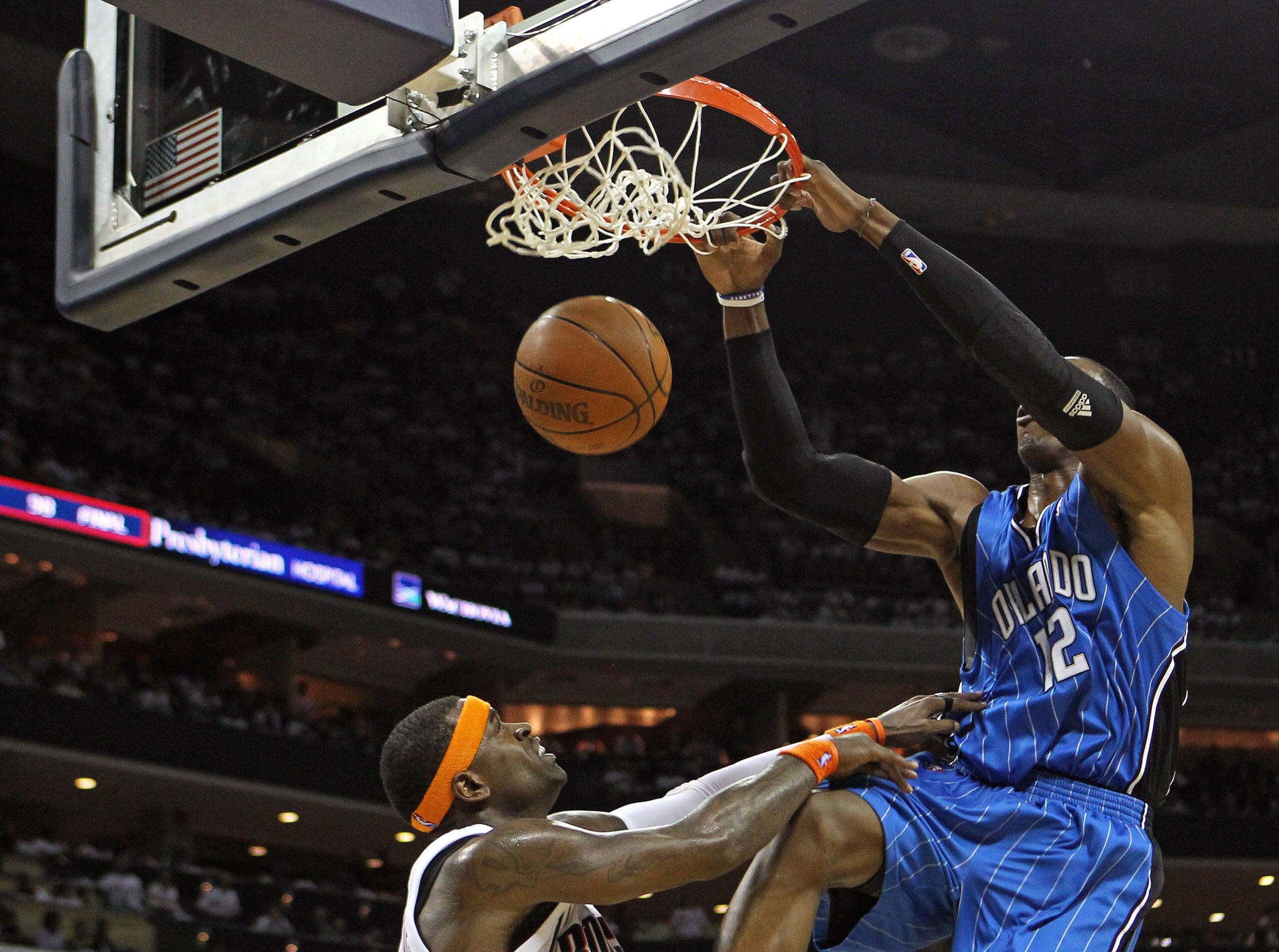 CHARLOTTE, NC - APRIL 24: Center Dwight Howard #12 of the Orlando Magic dunks on guard Stephen Jackson #1 of the Charlotte Bobcats during Game Three of the Eastern Conference Quarterfinals during the 2010 NBA Playoffs at Time Warner Cable Arena on April CHARLOTTE, NC - APRIL 24: Center Dwight Howard #12 of the Orlando Magic dunks on guard Stephen Jackson #1 of the Charlotte Bobcats during Game Three of the Eastern Conference Quarterfinals during the 2010 NBA Playoffs at Time Warner Cable Arena on April