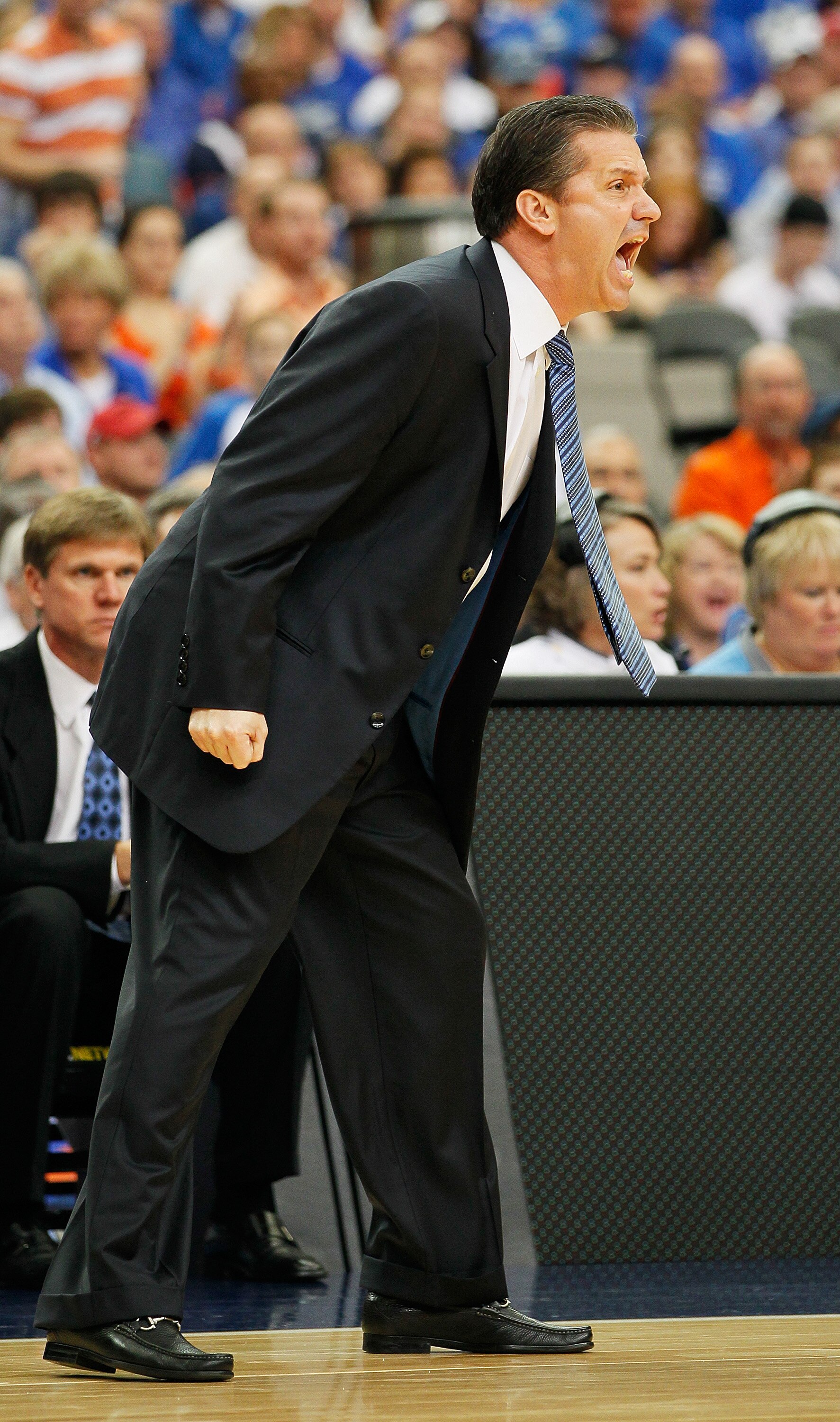 ATLANTA, GA - MARCH 13:  Head coach John Calipari of the Kentucky Wildcats coaches against the Florida Gators during the championship game of the SEC Men's Basketball Tournament at Georgia Dome on March 13, 2011 in Atlanta, Georgia.  (Photo by Kevin C. Co