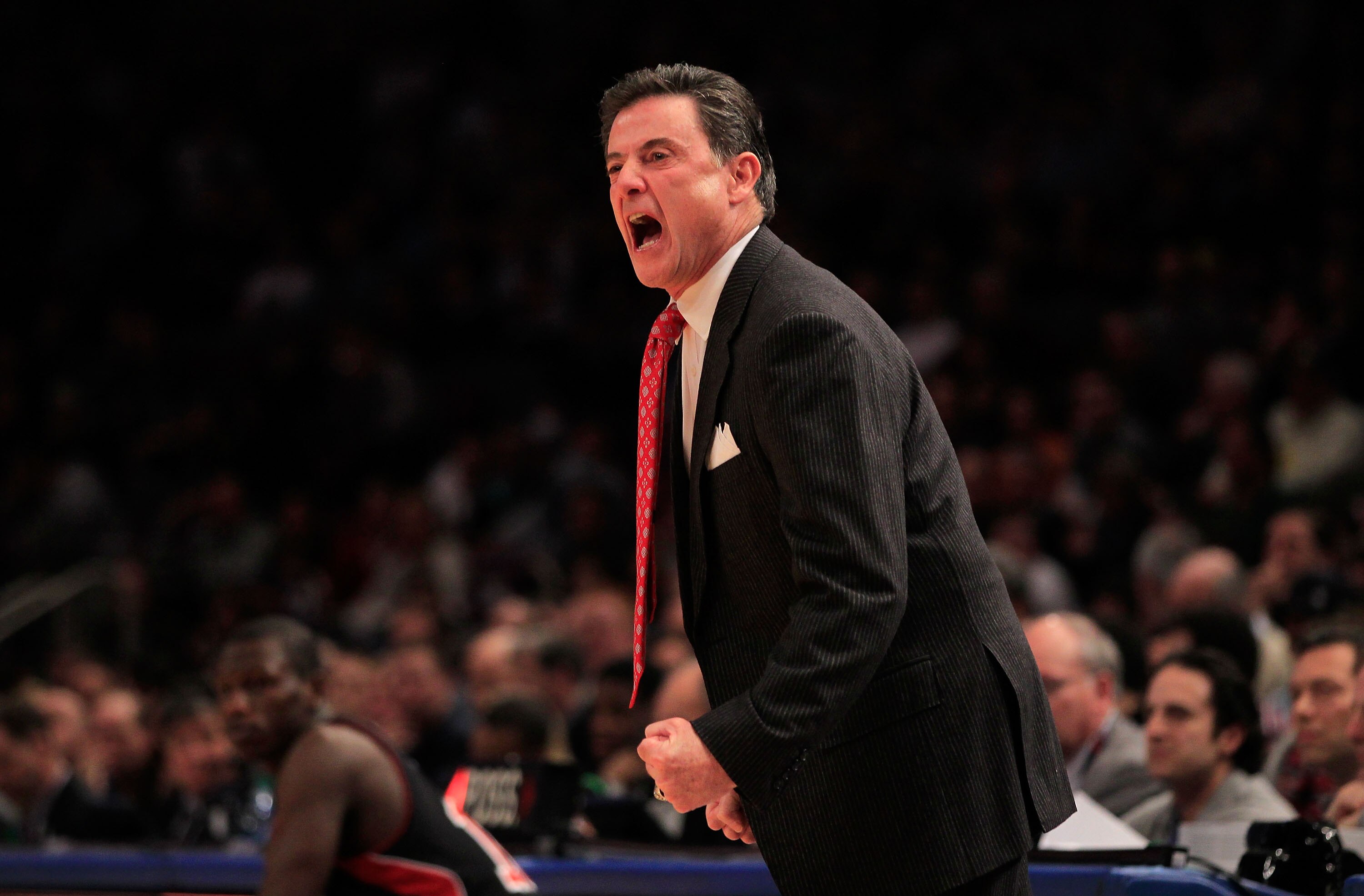NEW YORK, NY - MARCH 11:  head coach Rick Pitino of the Louisville Cardinals looks on from the bench during the game against the Notre Dame Fighting Irish during the semifinals of the 2011 Big East Men's Basketball Tournament presented by American Eagle O