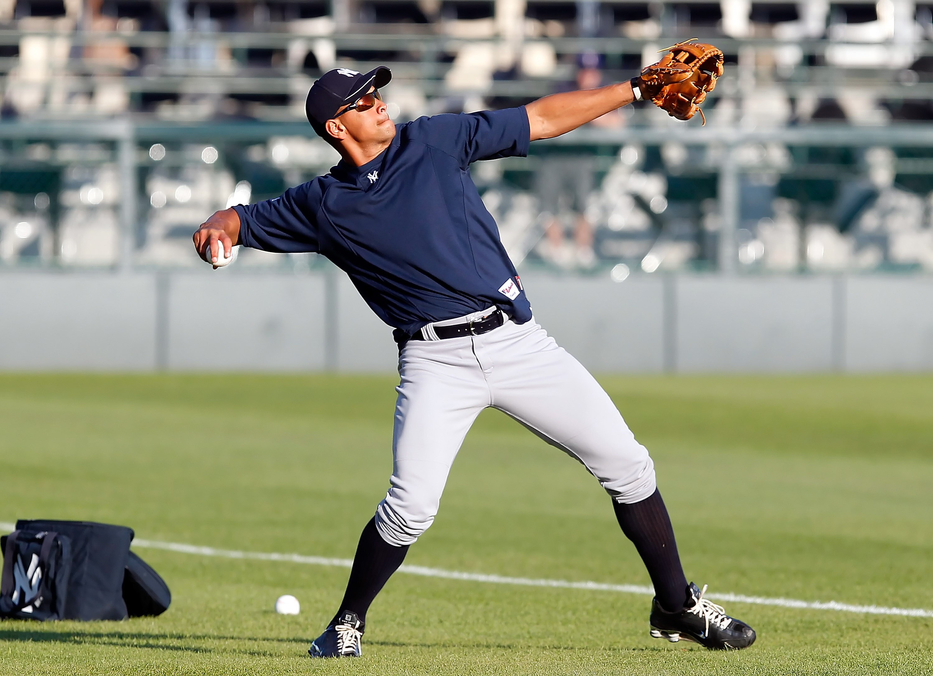 SARASOTA, FL - MARCH 07:  Infielder Alex Rodriguez #13 of the New York Yankees warms up just prior to the start of the Grapefruit League Spring Training Game against the Baltimore Orioles at Ed Smith Stadium on March 7, 2011 in Sarasota, Florida.  (Photo