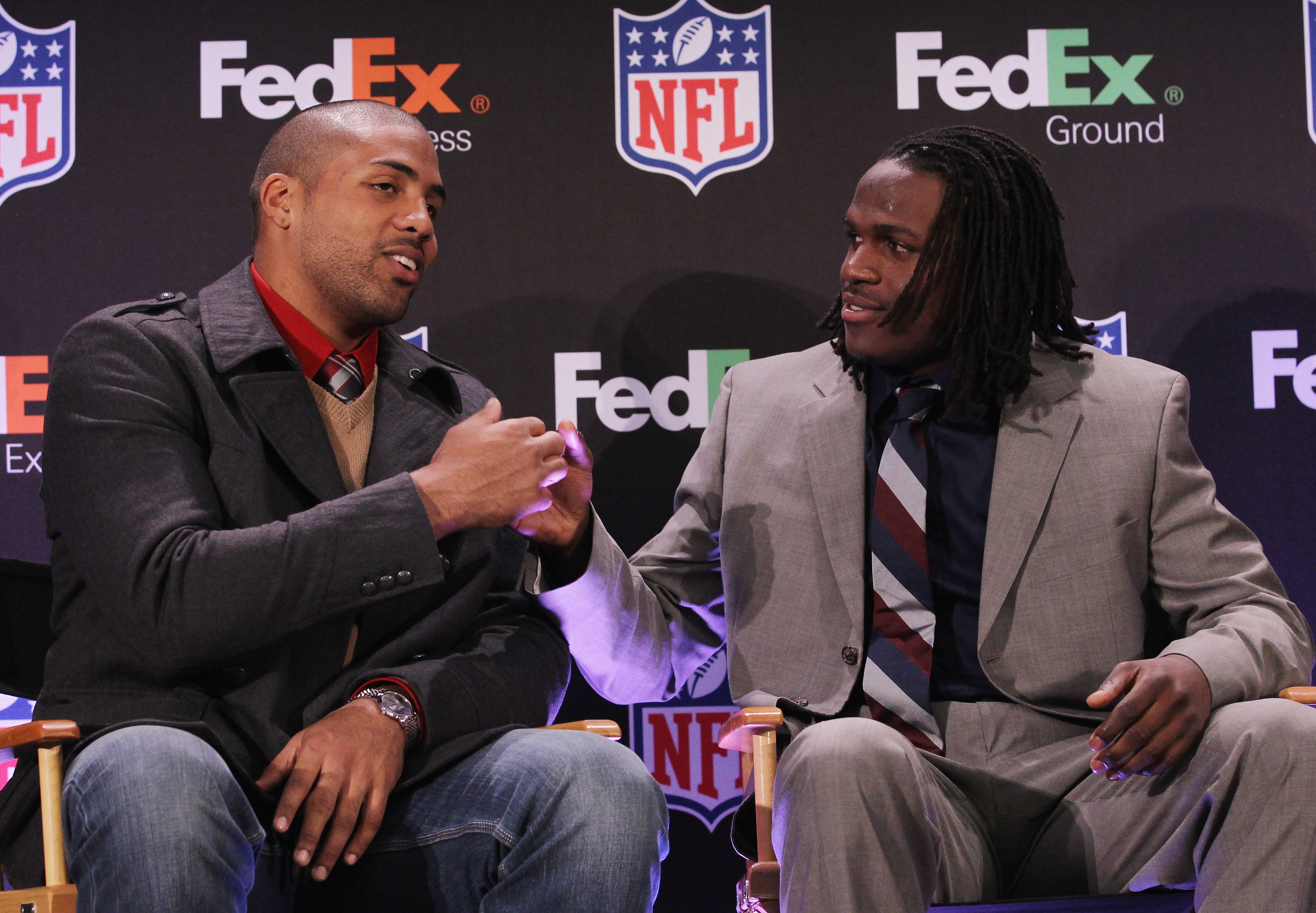 DALLAS, TX - FEBRUARY 02: Jamaal Charles (R) of the Kansas City Chiefs shakes hands with Arian Foster of the Houston Texans at the Super Bowl XLV media center on February 2, 2011 in Dallas, Texas. Charles was named FedEx Ground NFL Player of the Year. (Ph