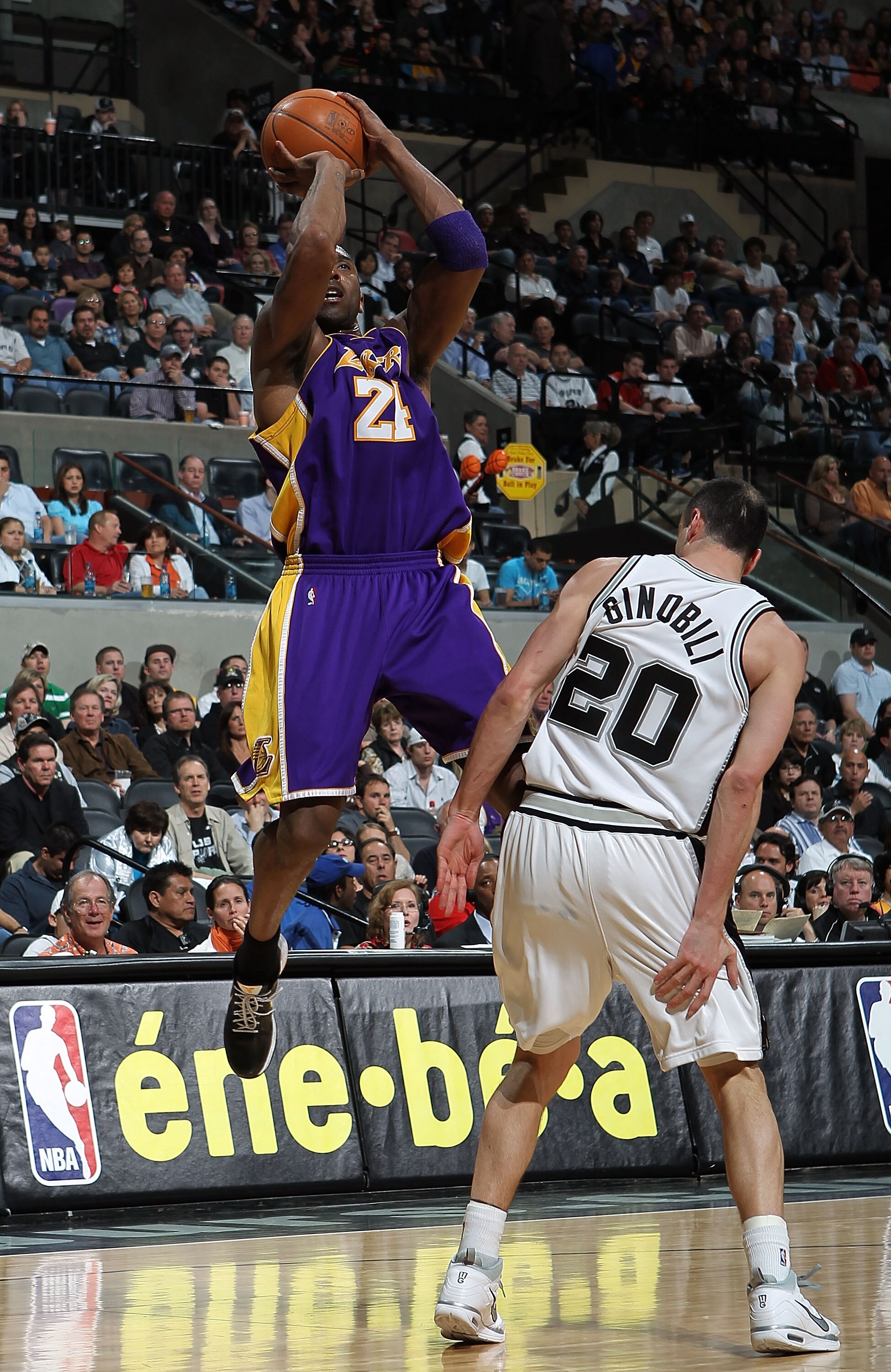 SAN ANTONIO - MARCH 24: Guard Kobe Bryant #24 of the Los Angeles Lakers takes a shot against Manu Ginobili #20 of the San Antonio Spurs at AT&T Center on March 24, 2010 in San Antonio, Texas. NOTE TO USER: User expressly acknowledges and agrees that, by d