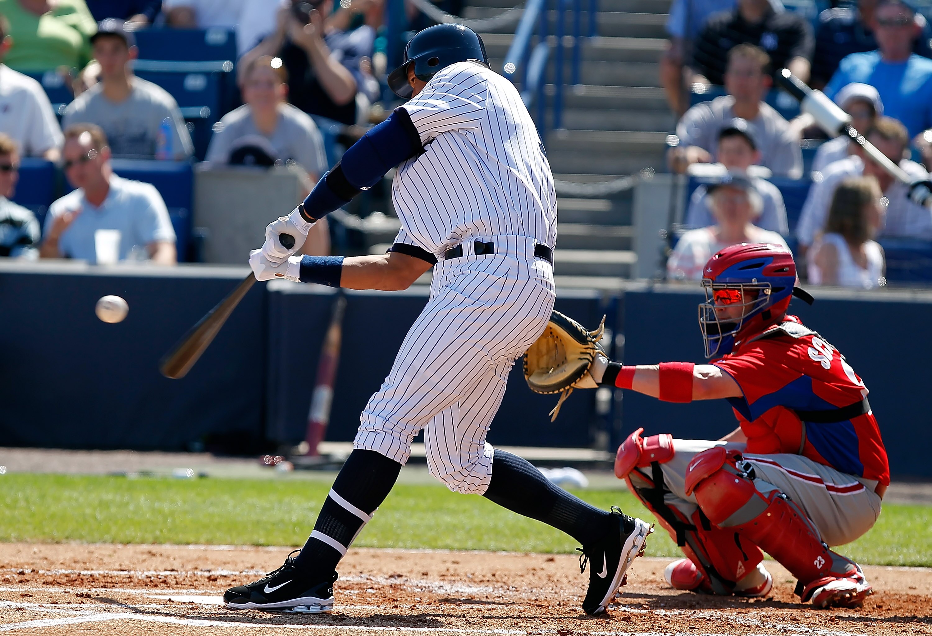 TAMPA, FL - FEBRUARY 26:  Infielder Alex Rodriguez #13 of the New York Yankees fouls off a pitch as catcher, Brian Schneider #23 of the Philadelphia Phillies looks on during a Grapefruit League Spring Training Game at George M. Steinbrenner Field on Febru