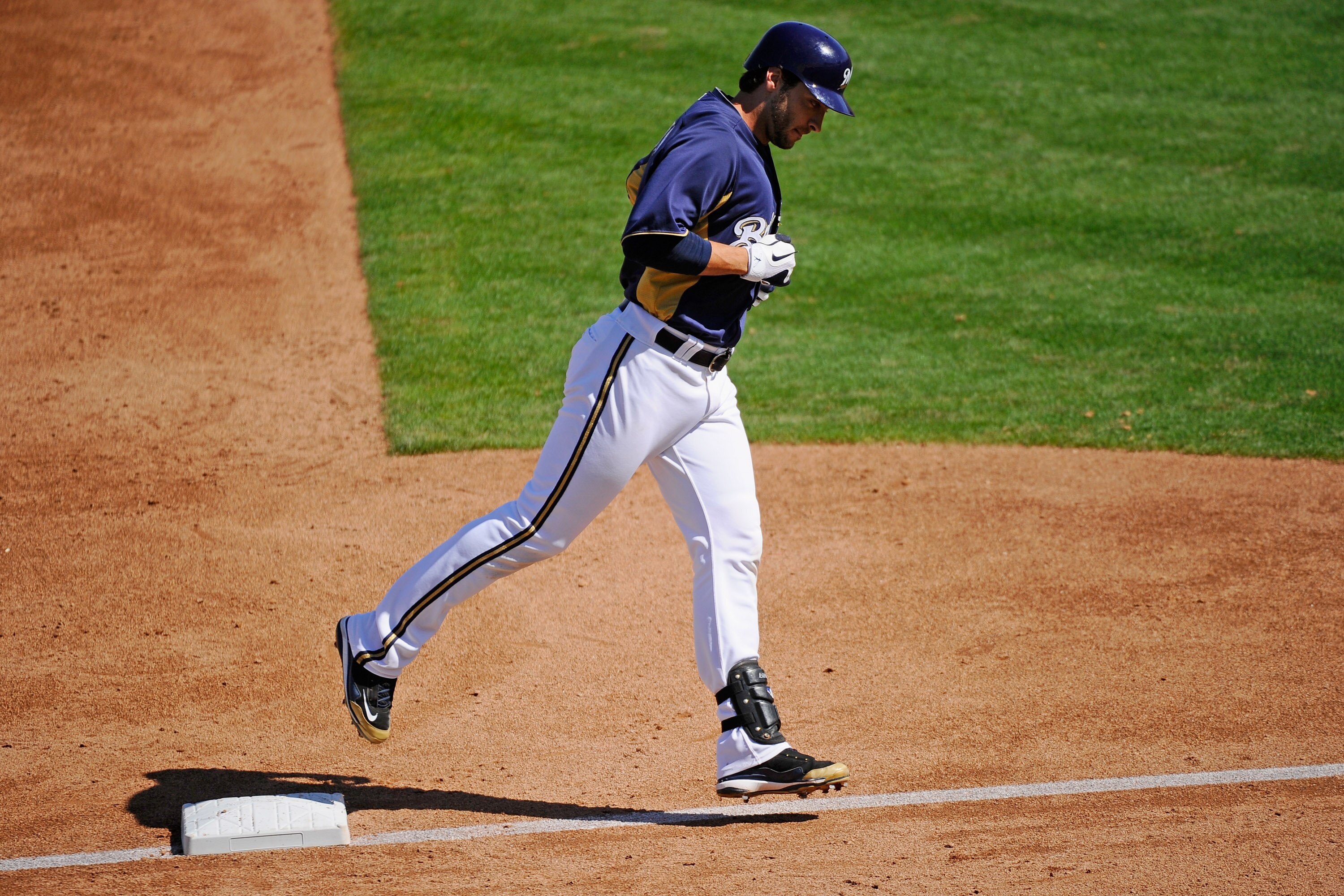 PHOENIX, AZ - MARCH 10:  Ryan Braun #8 of the Milwaukee Brewers runs the bases after hitting a three-run home run against the Colorado Rockies in the third inning of the spring training baseball game at Maryvale Baseball Park on March 10, 2011 in Phoenix,