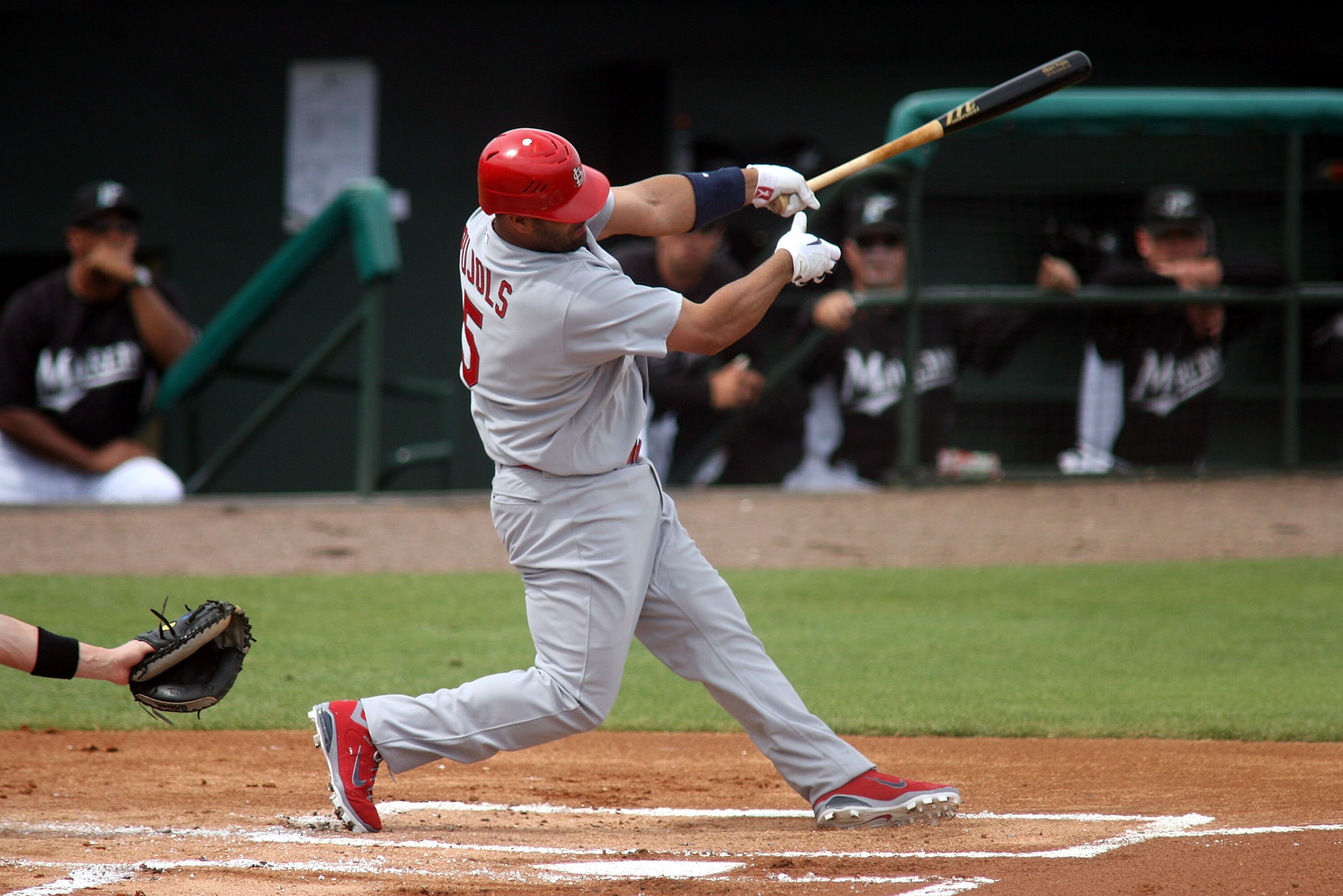 JUPITER, FL - MARCH 06:  First baseman Albert Pujols #5 of the St. Louis Cardinals bats against the Florida Marlins at Roger Dean Stadium on March 6, 2011 in Jupiter, Florida.  (Photo by Marc Serota/Getty Images)