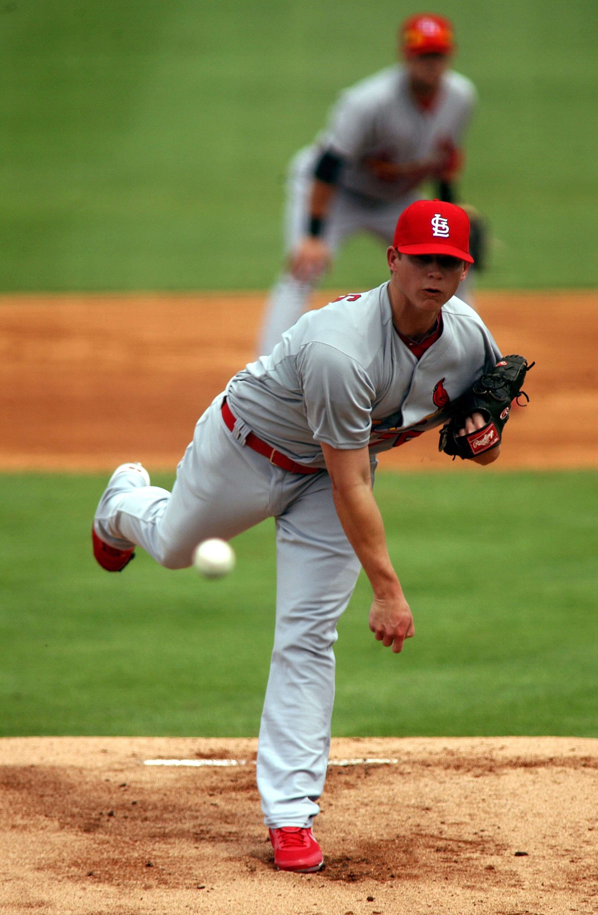 JUPITER, FL - MARCH 06:  Pitcher Kevin Thomas #75 of the St. Louis Cardinals throws against the Florida Marlins at Roger Dean Stadium on March 6, 2011 in Jupiter, Florida.  (Photo by Marc Serota/Getty Images)