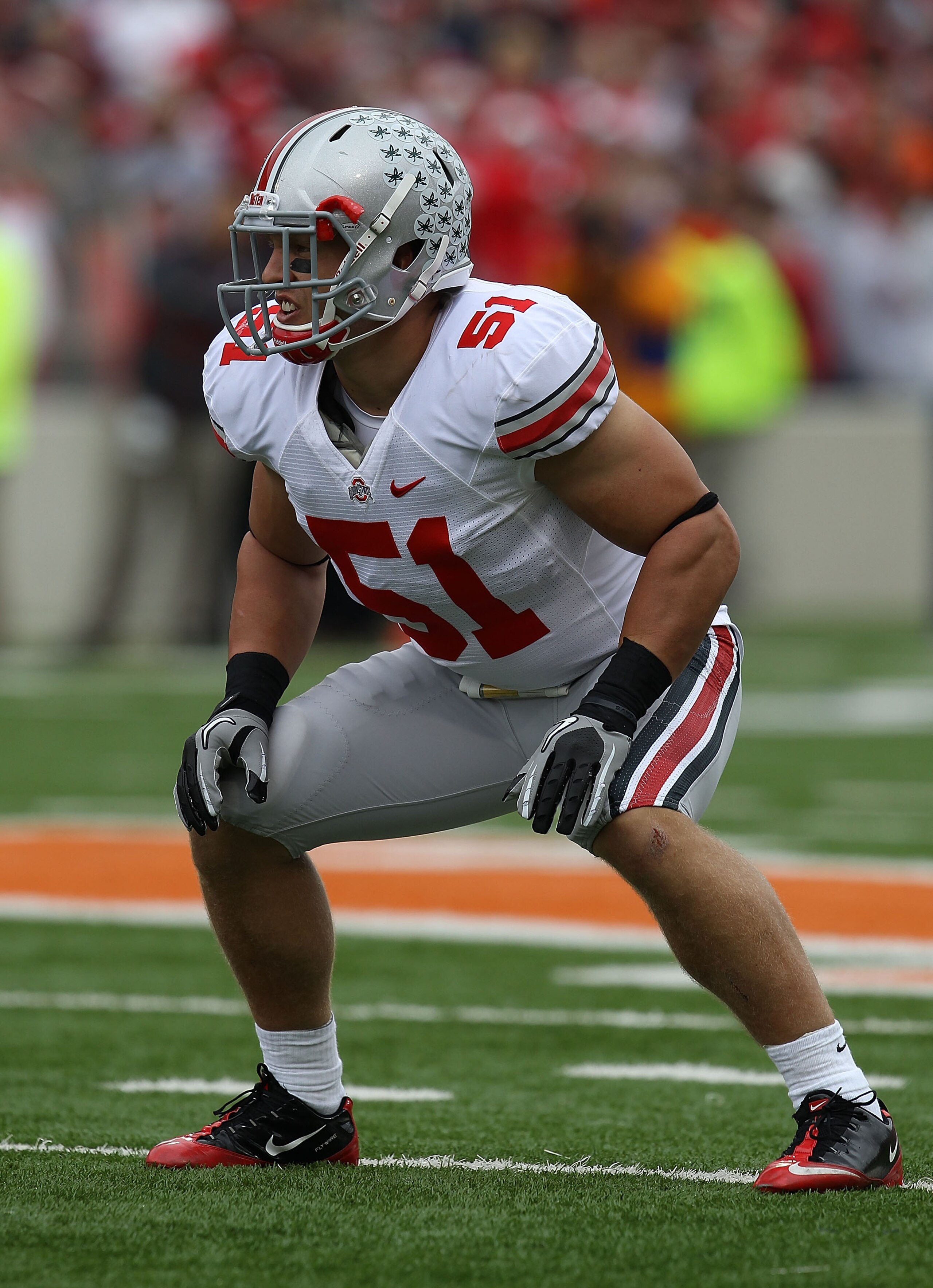 CHAMPAIGN, IL - OCTOBER 02: Ross Homan #51 of the Ohio State Buckeyes awaits the start of play against the Illinois Fighting Illini at Memorial Stadium on October 2, 2010 in Champaign, Illinois. Ohio State defeated Illinois 24-13. (Photo by Jonathan Danie