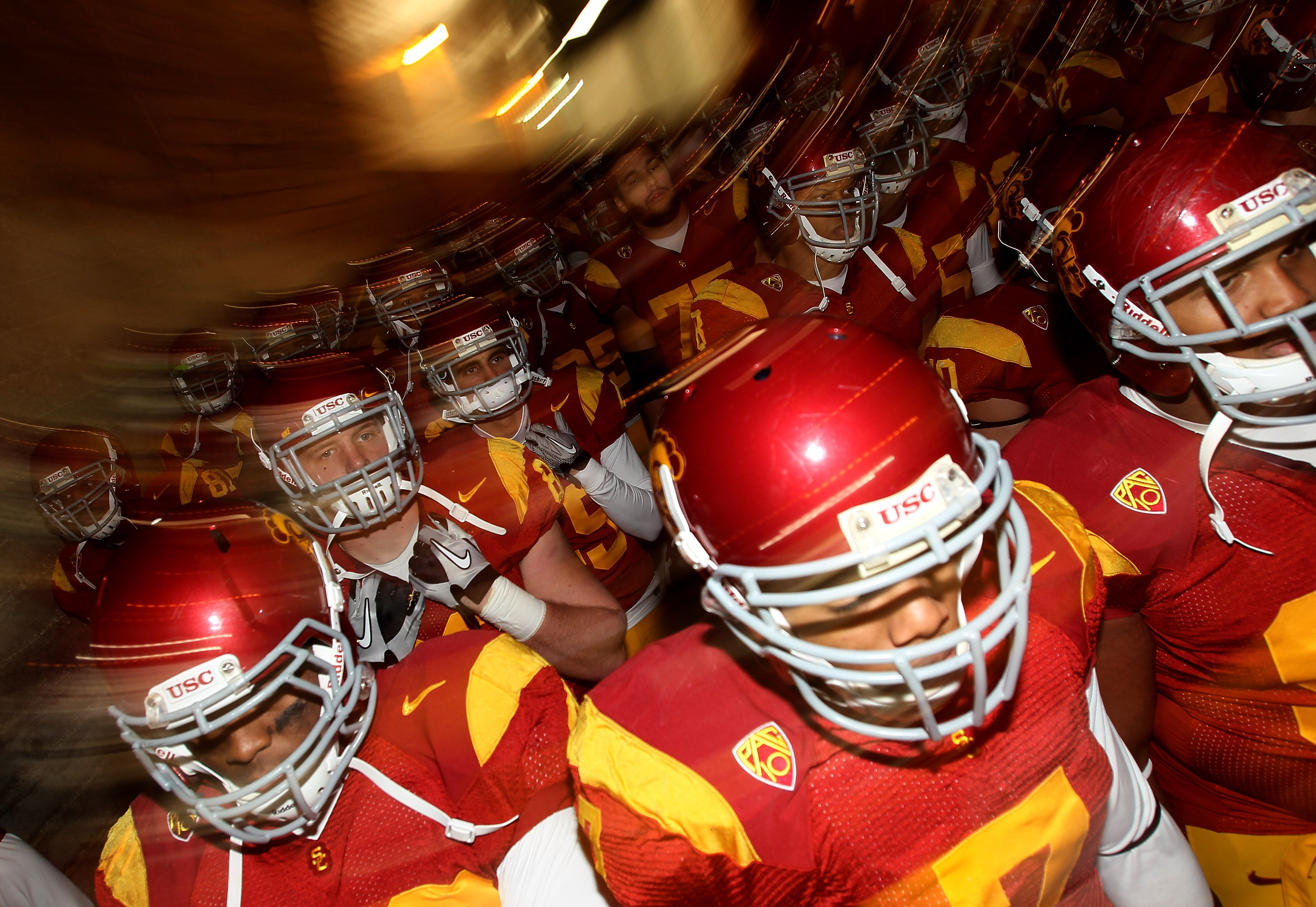 LOS ANGELES - NOVEMBER 27:   The USC Trojans come through the tunnel to the field before the game with the Notre Dame Fighting Irish at the Los Angeles Memorial Coliseum on November 27, 2010 in Los Angeles, California.   (Photo by Stephen Dunn/Getty Image