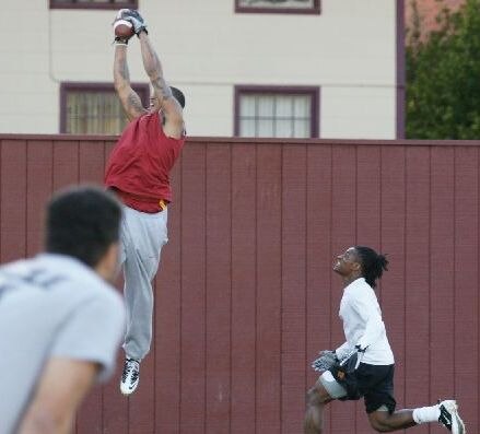Kyle Prater reaches high during Winter Workouts