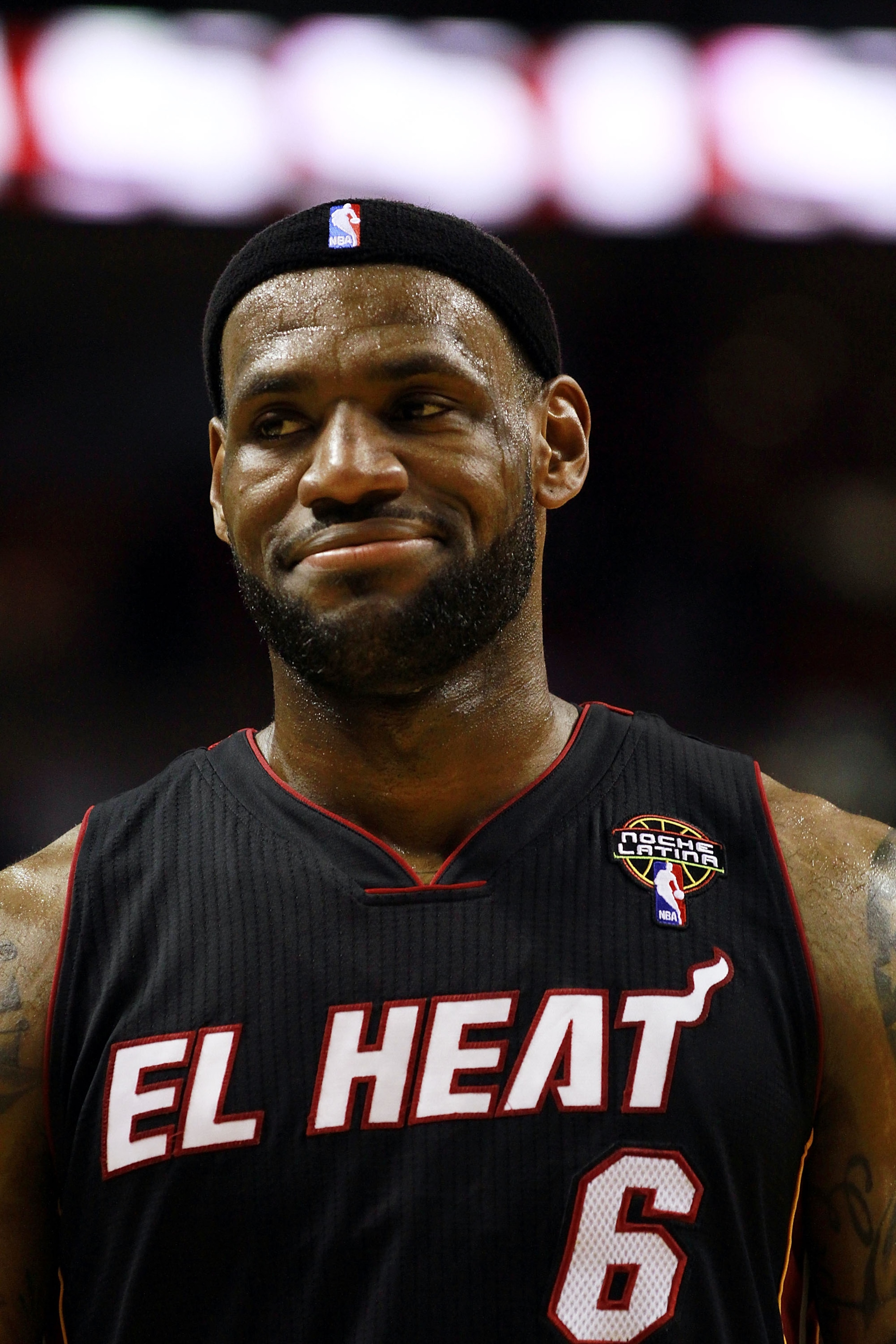 MIAMI - MARCH 14:  Forward LeBron James #6 of the Miami Heat smiles against the San Antonio Spurs at American Airlines Arena on March 14, 2011 in Miami, Florida. NOTE TO USER: User expressly acknowledges and agrees that, by downloading and/or using this P