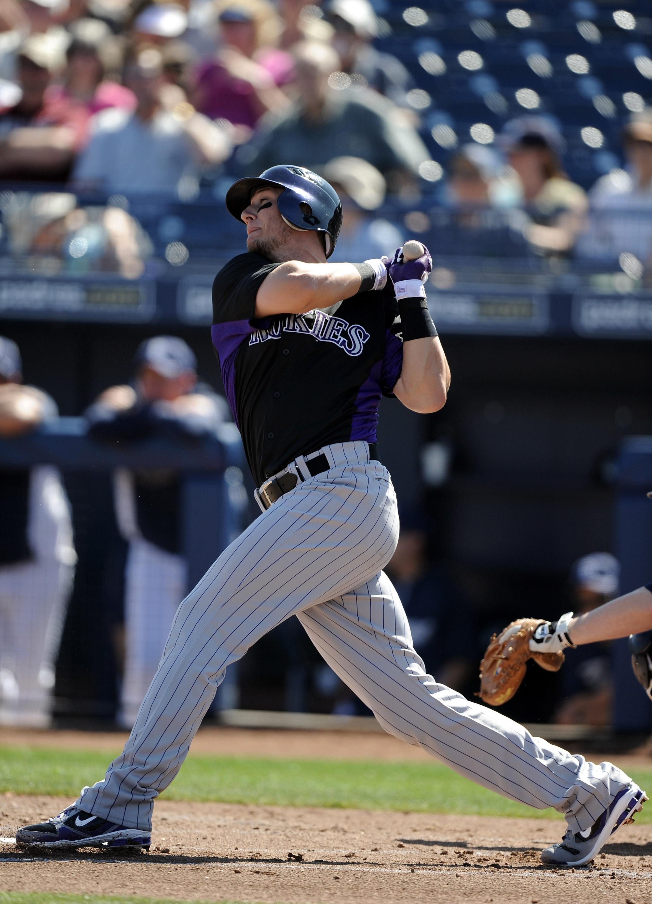PEORIA, AZ - MARCH 02: Troy Tulowitzki #2 of the Colorado Rockies at bat against the San Diego Padres during spring training at Peoria Stadium on March 2, 2011 in Peoria, Arizona. (Photo by Harry How/Getty Images) PEORIA, AZ - MARCH 02: Troy Tulowitzki #2 of the Colorado Rockies at bat against the San Diego Padres during spring training at Peoria Stadium on March 2, 2011 in Peoria, Arizona. (Photo by Harry How/Getty Images)