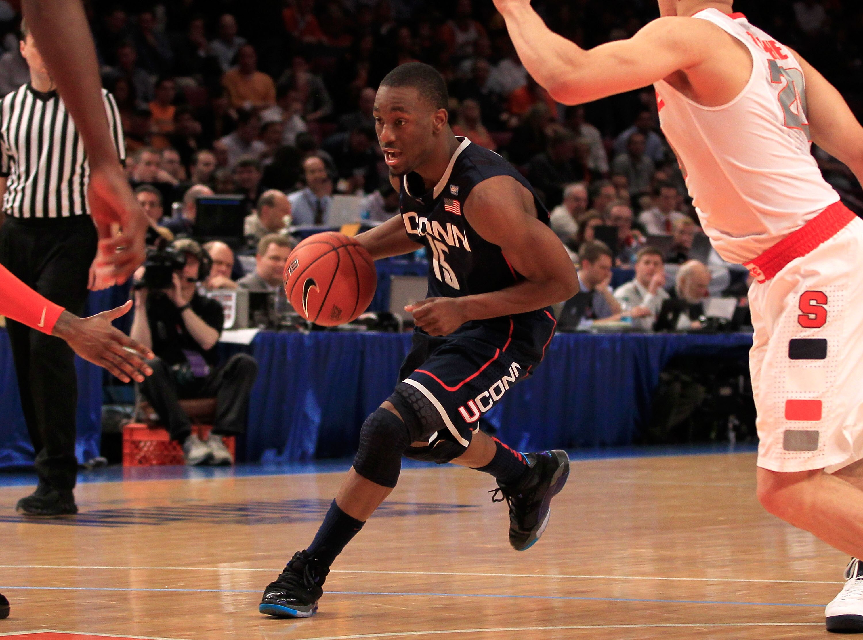 NEW YORK, NY - MARCH 11: Kemba Walker #15 of the Connecticut Huskies drives with the ball against the Syracuse Orange during the semifinals of the 2011 Big East Men's Basketball Tournament presented by American Eagle Outfitters at Madison Square Garden on